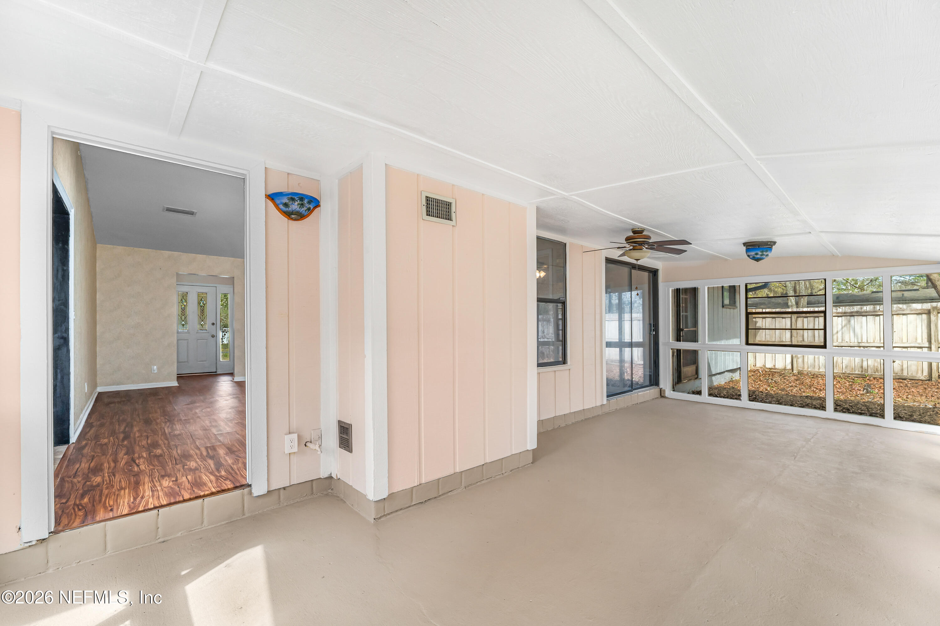 2823 Jewell Road Jacksonville, FL 32216 - Photo 38 of 59 an empty room with entrance and windows