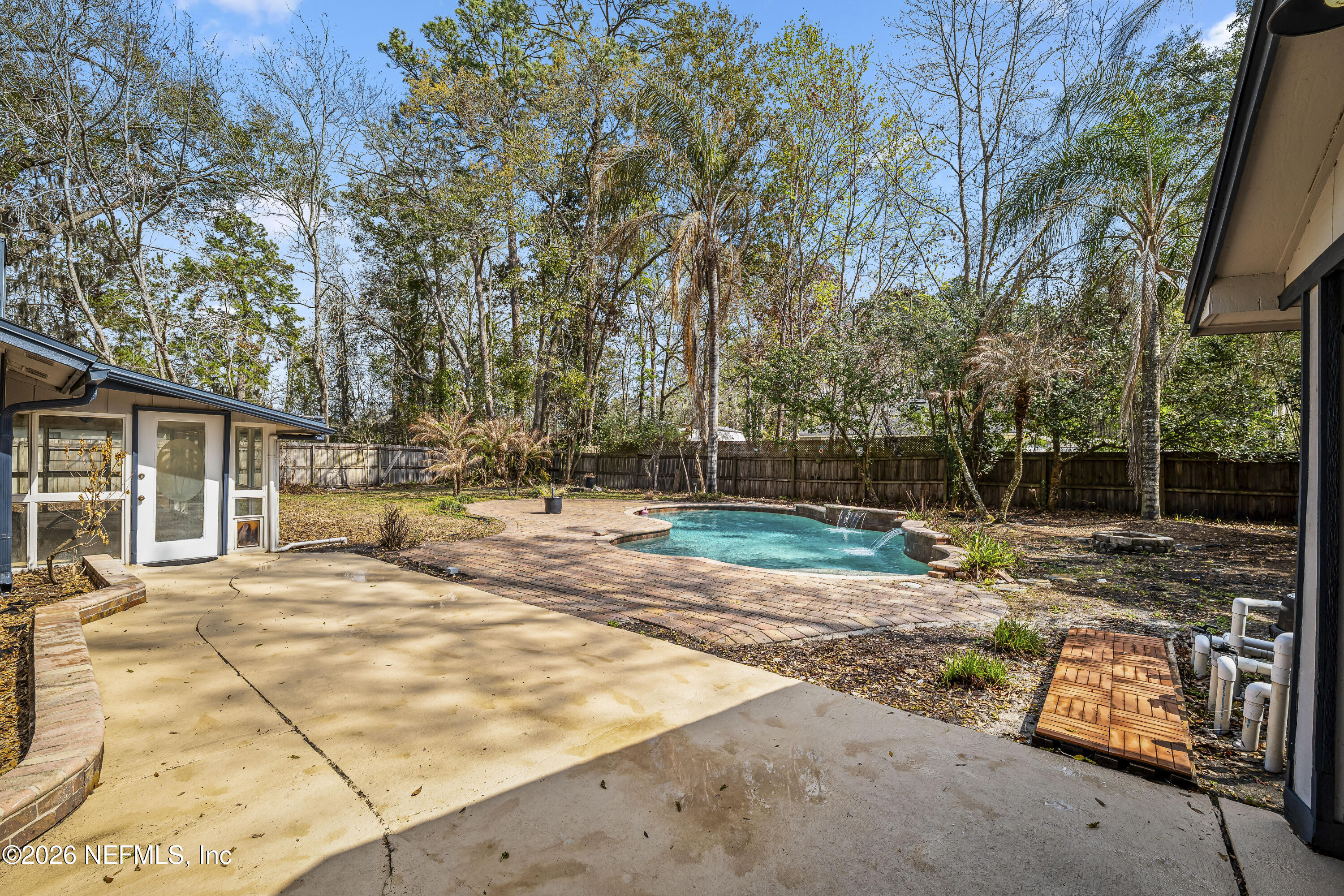 2823 Jewell Road Jacksonville, FL 32216 - Photo 39 of 59 a view of a yard with plants and trees