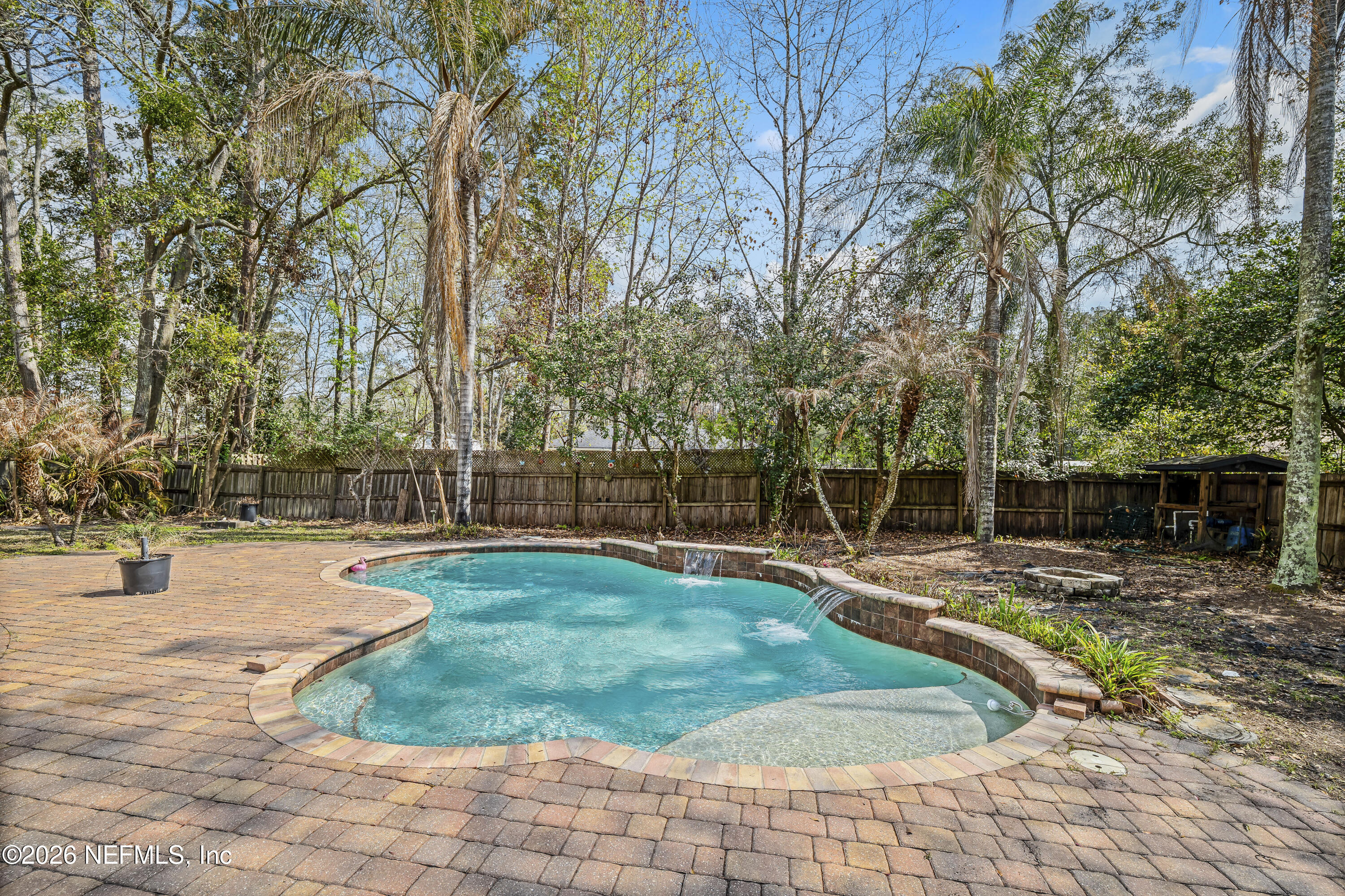 2823 Jewell Road Jacksonville, FL 32216 - Photo 40 of 59 a view of a swimming pool with a patio