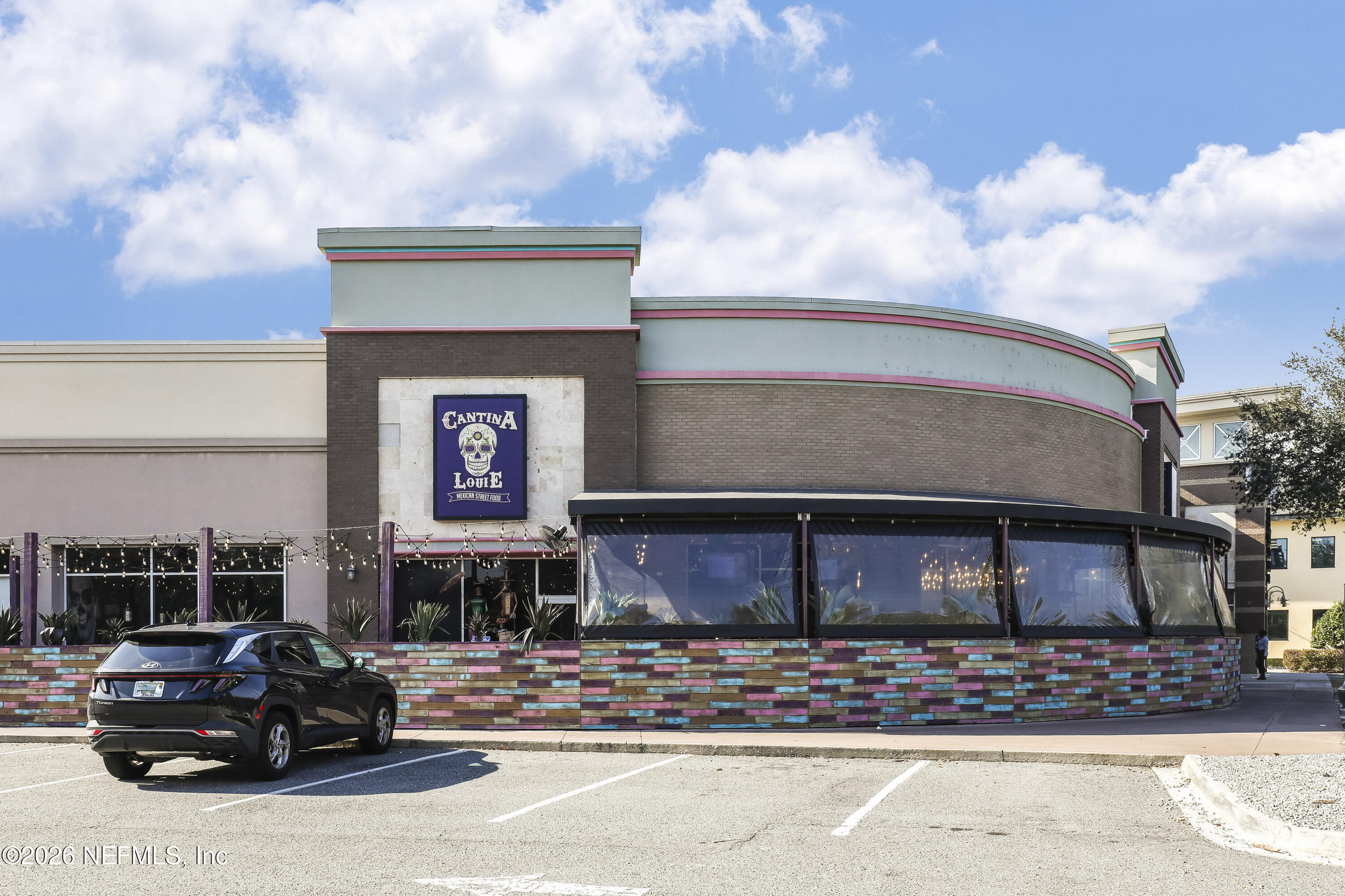 2823 Jewell Road Jacksonville, FL 32216 - Photo 51 of 59 a car parked in front of a building