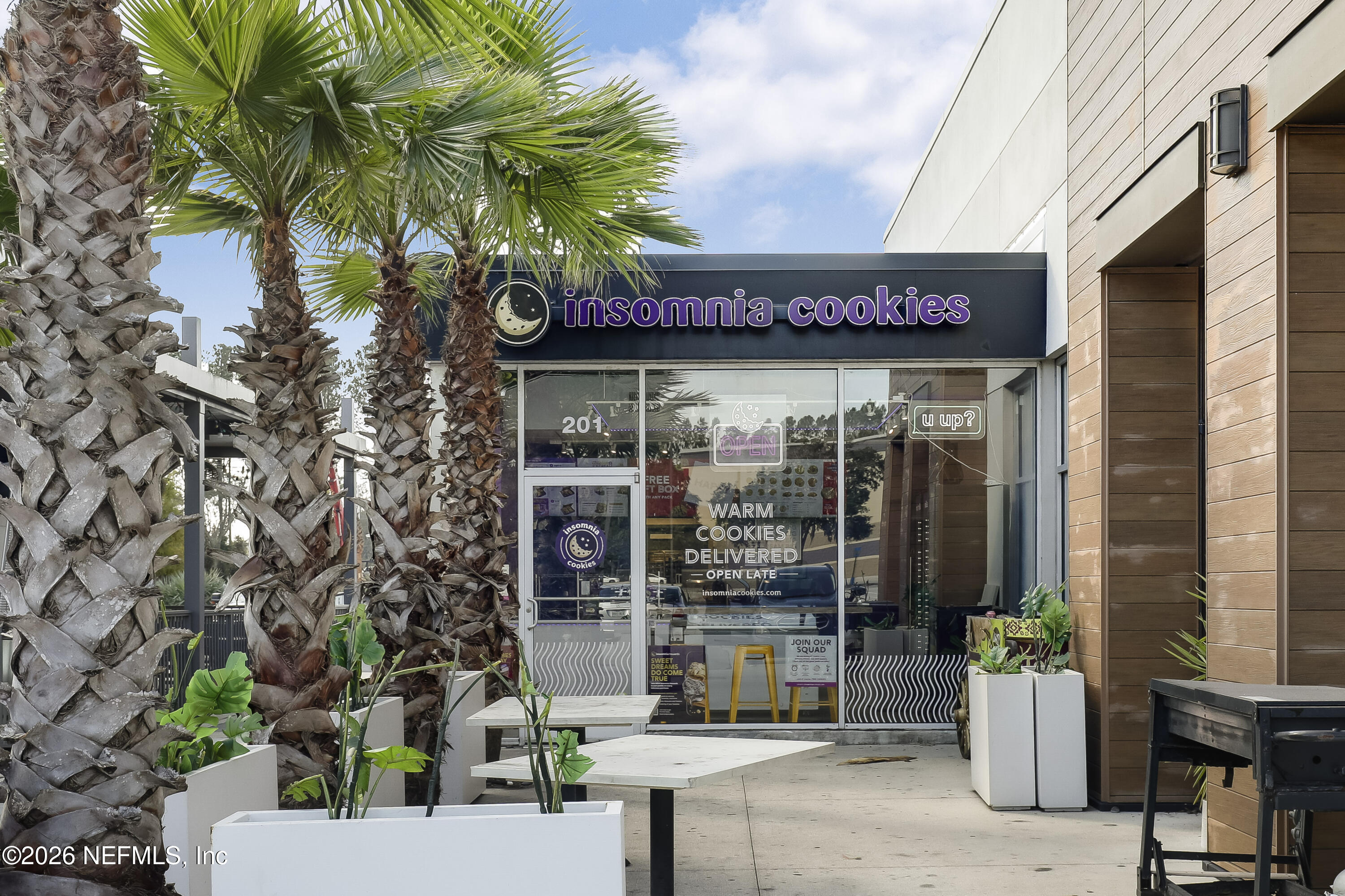 2823 Jewell Road Jacksonville, FL 32216 - Photo 52 of 59 a view of a chairs and table in a patio