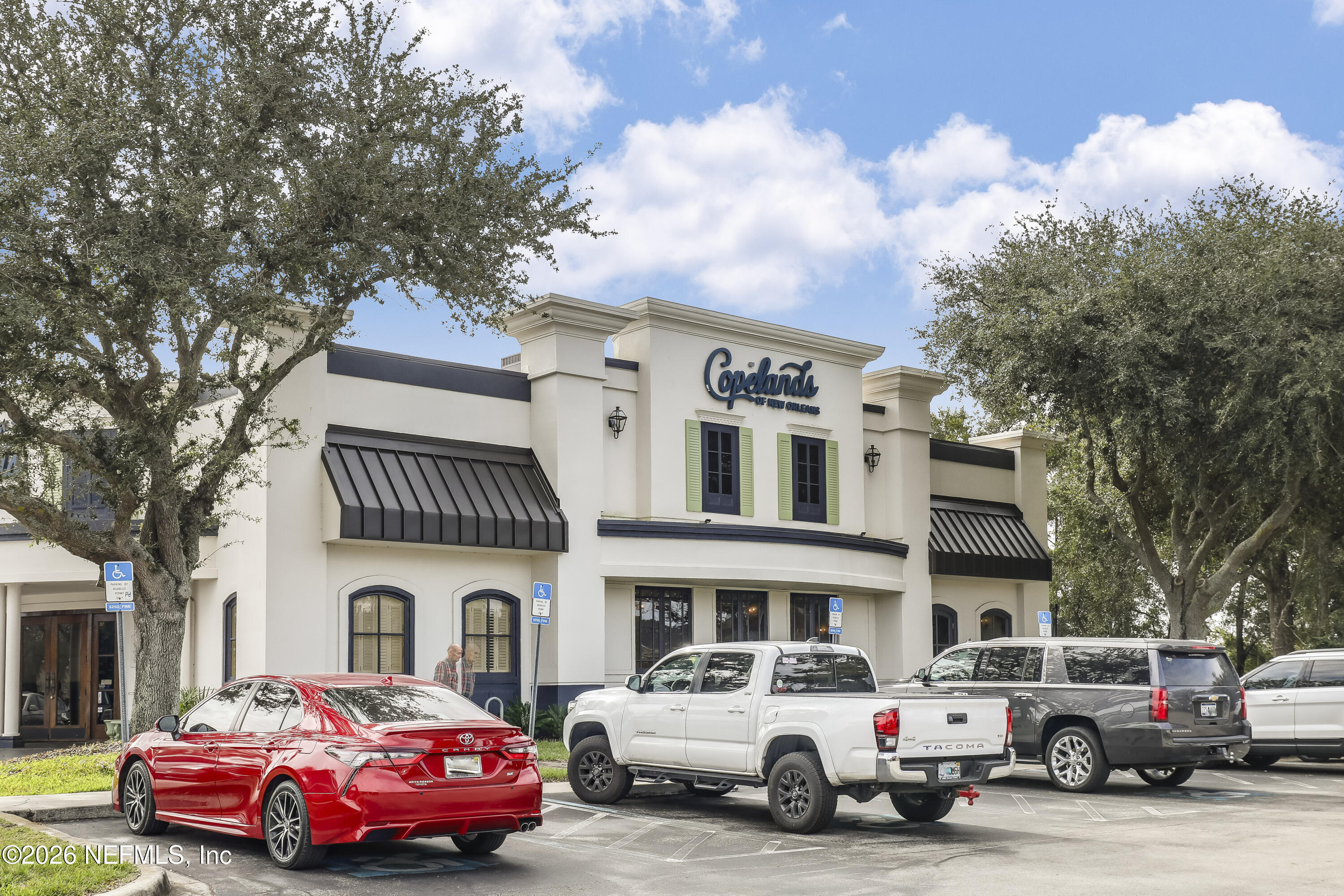 2823 Jewell Road Jacksonville, FL 32216 - Photo 53 of 59 a cars parked in front of a building