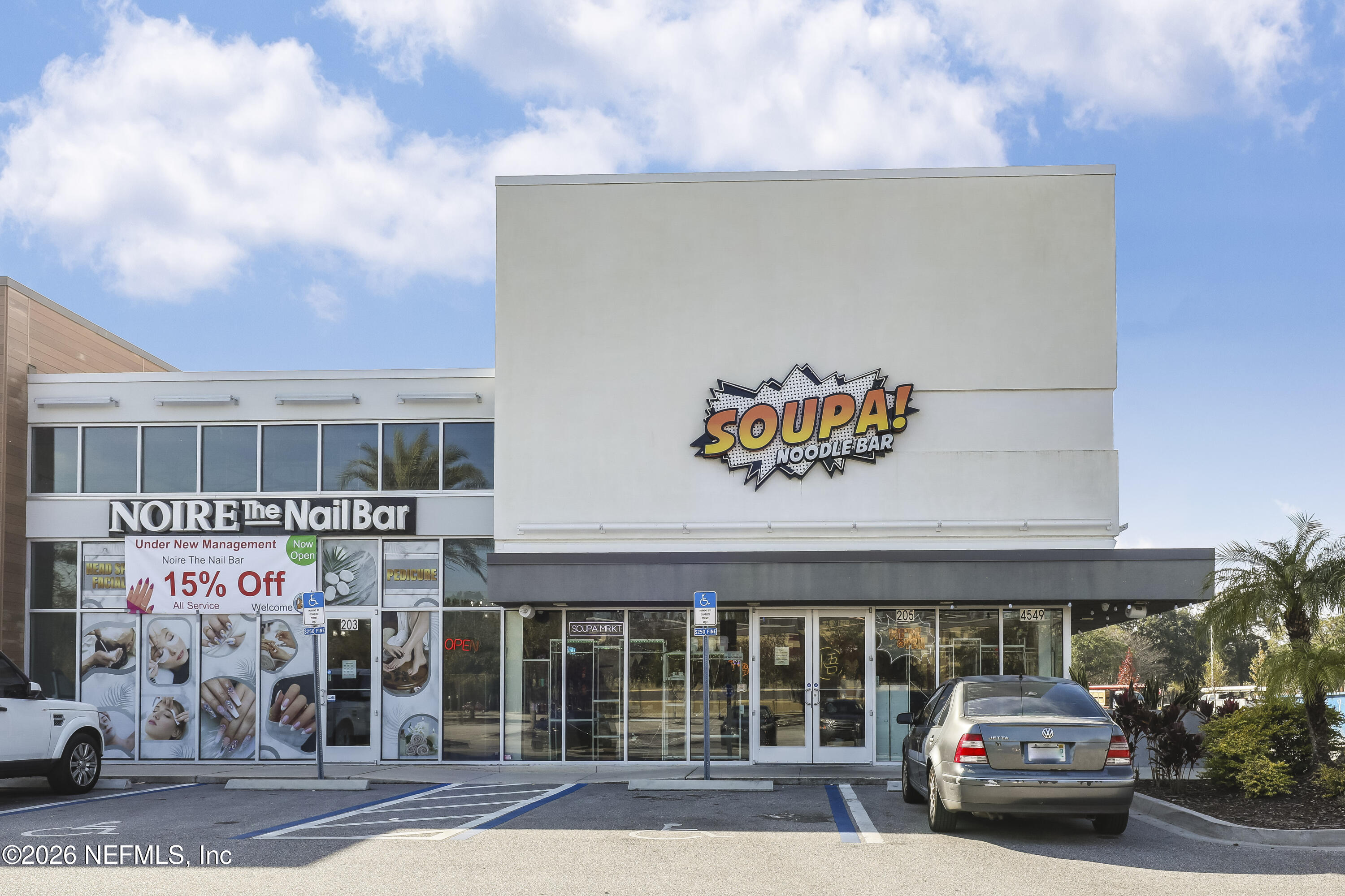 2823 Jewell Road Jacksonville, FL 32216 - Photo 54 of 59 a car parked in front of a building