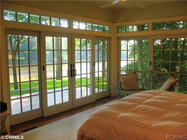 1512 Laurel Point Road Lancaster, VA 22503 - Photo 5 of 12 Master Bedroom - Master Suite has glass doors lead