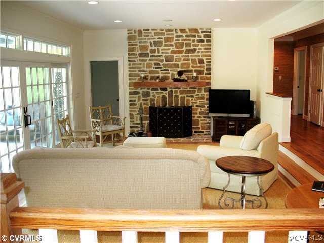 1512 Laurel Point Road Lancaster, VA 22503 - Photo 6 of 12 Living Room - Living room with glass doors leading