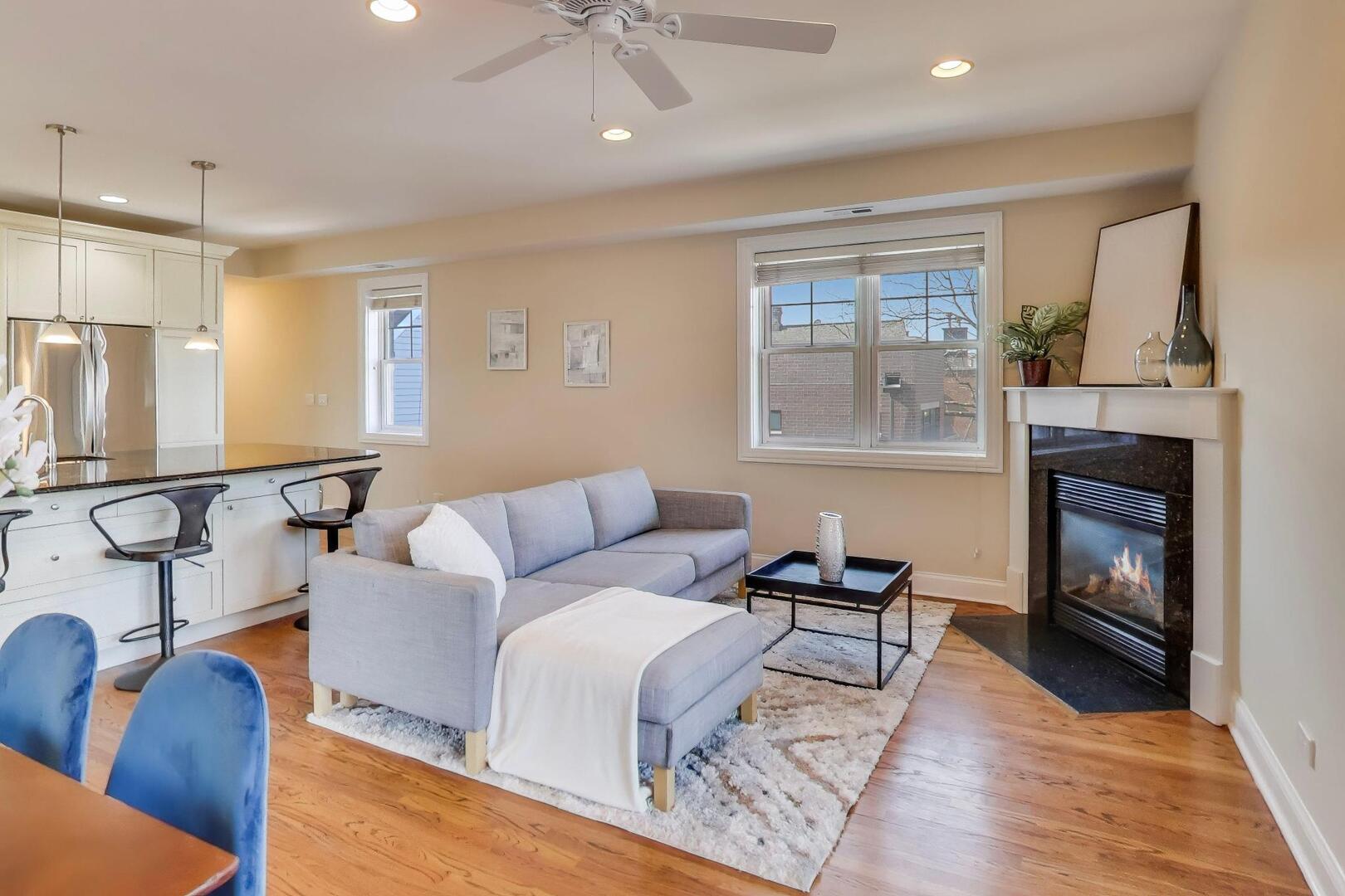 1400 West George Street, Unit 3 Chicago, IL 60657 - Photo 11 of 46 a living room with furniture fireplace and window