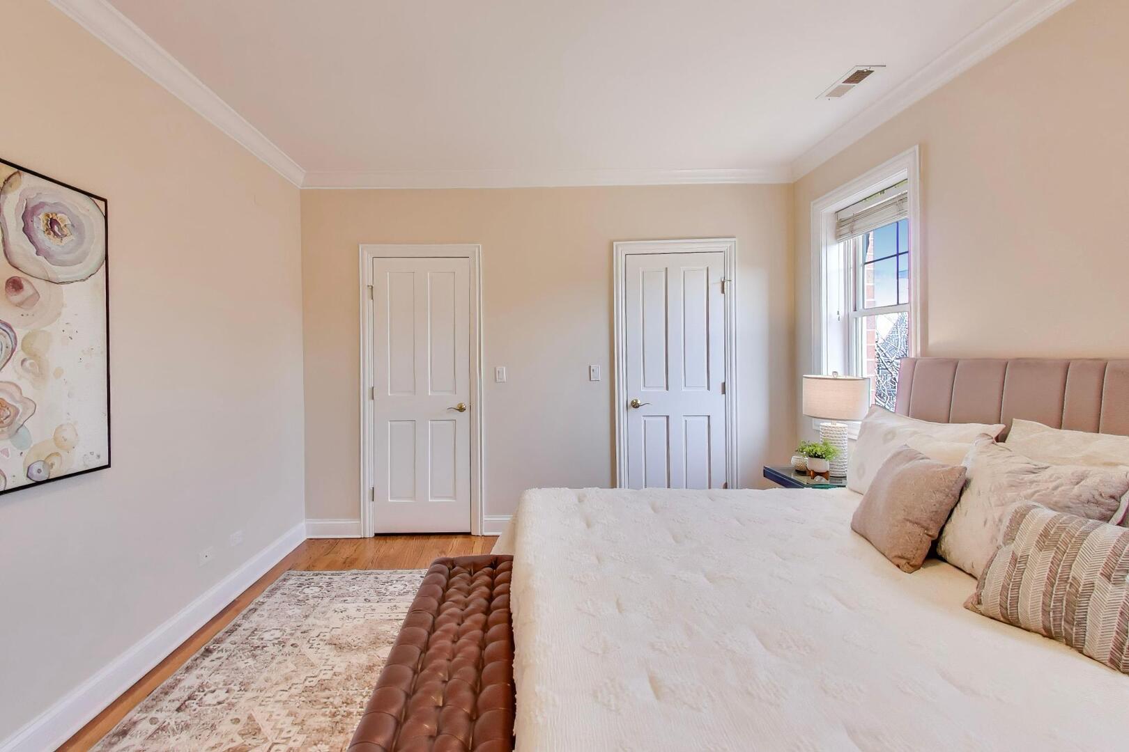 1400 West George Street, Unit 3 Chicago, IL 60657 - Photo 15 of 46 a bedroom with a bed and a window