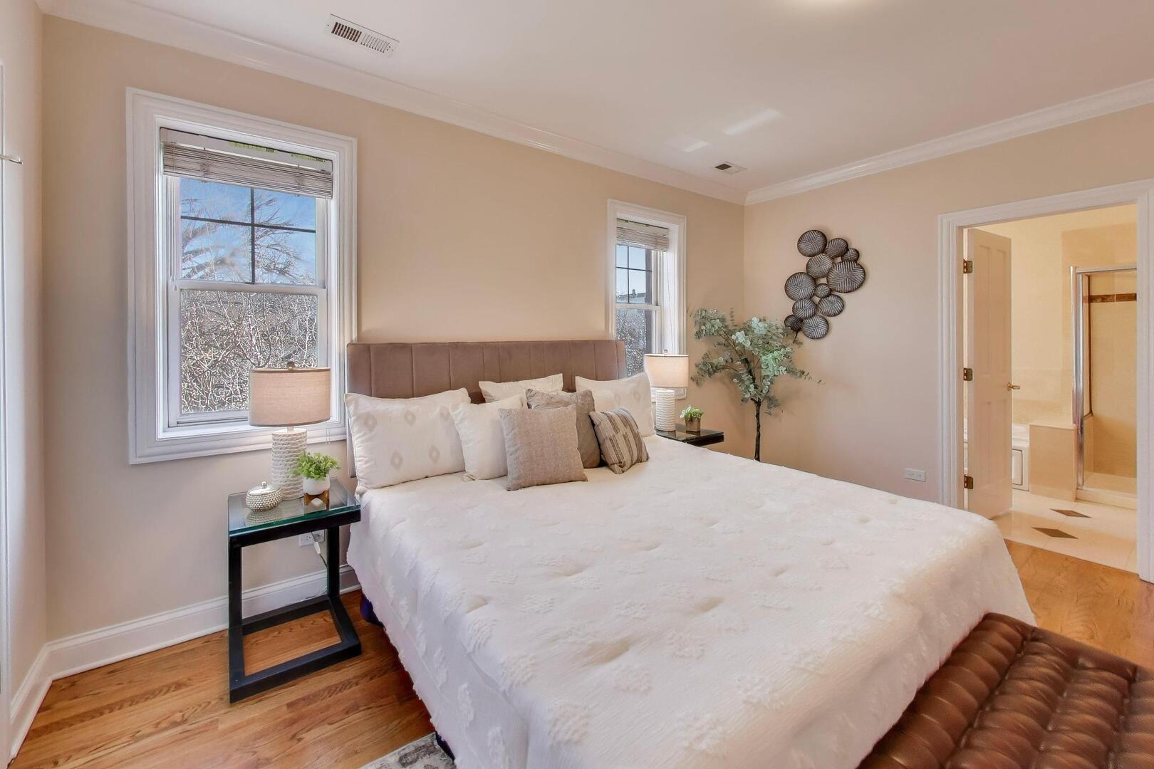 1400 West George Street, Unit 3 Chicago, IL 60657 - Photo 17 of 46 a bedroom with a bed and a window