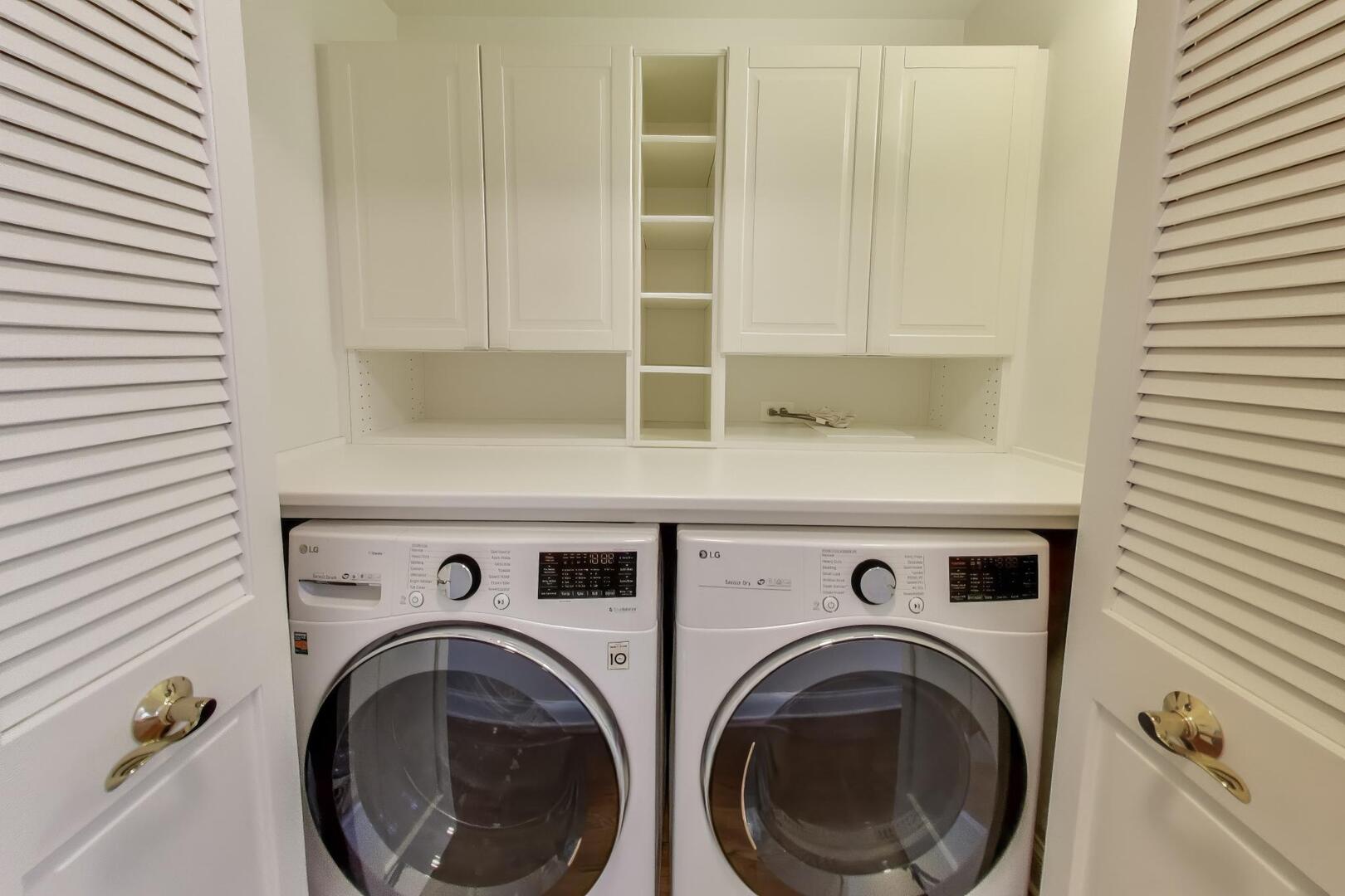 1400 West George Street, Unit 3 Chicago, IL 60657 - Photo 25 of 46 a utility room with dryer and washer
