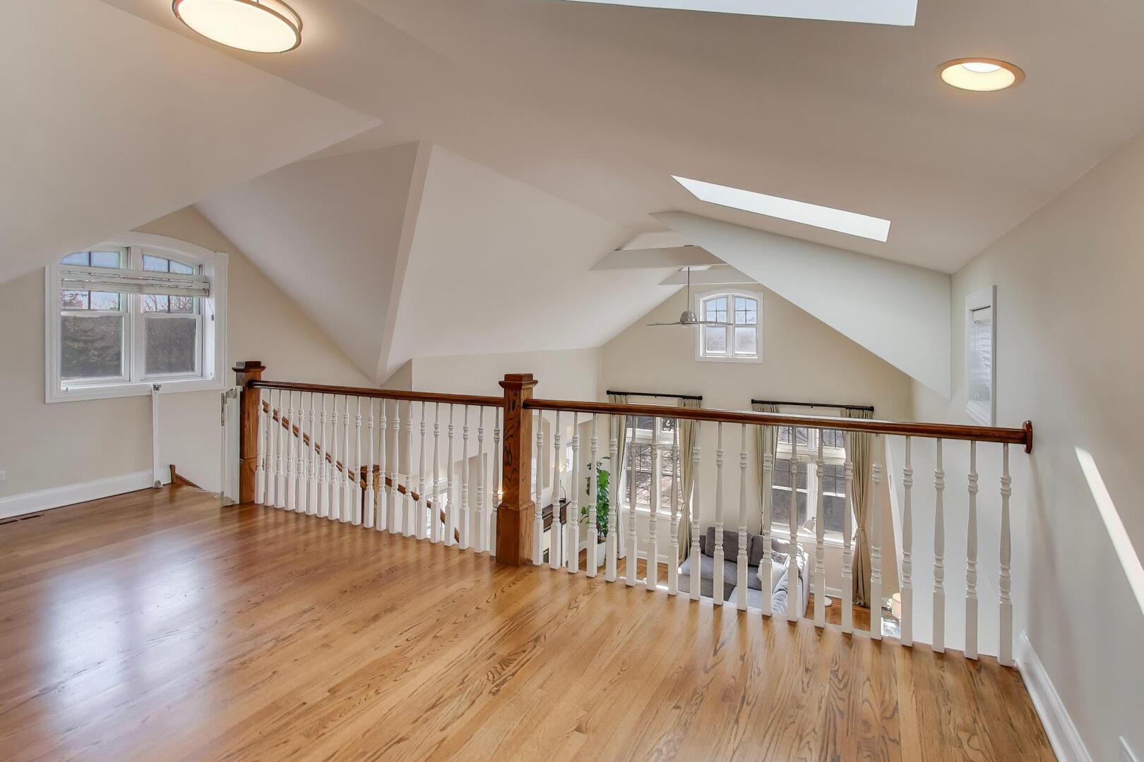 1400 West George Street, Unit 3 Chicago, IL 60657 - Photo 26 of 46 a view of staircase with wooden floor and front door