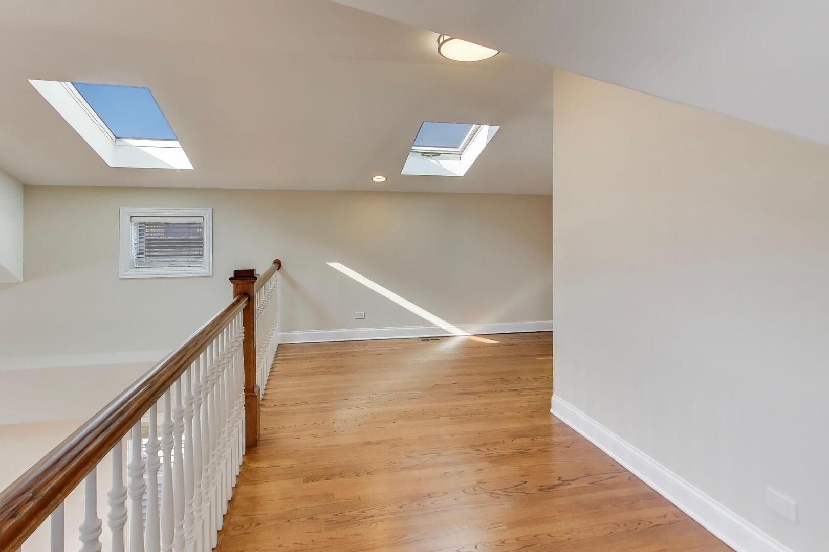 1400 West George Street, Unit 3 Chicago, IL 60657 - Photo 27 of 46 a view of a hallway with staircase