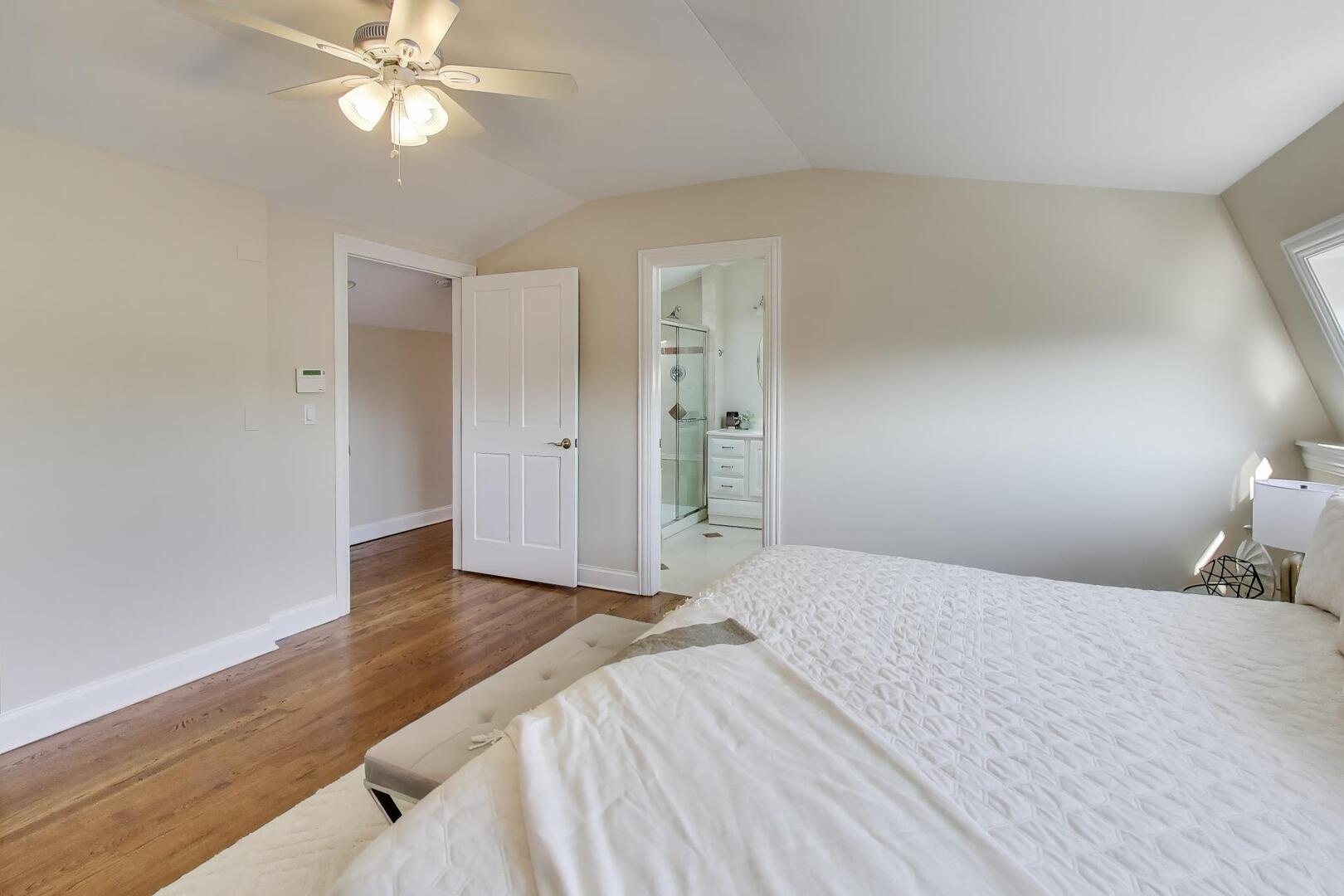 1400 West George Street, Unit 3 Chicago, IL 60657 - Photo 33 of 46 a bedroom with a bed and a chandelier fan