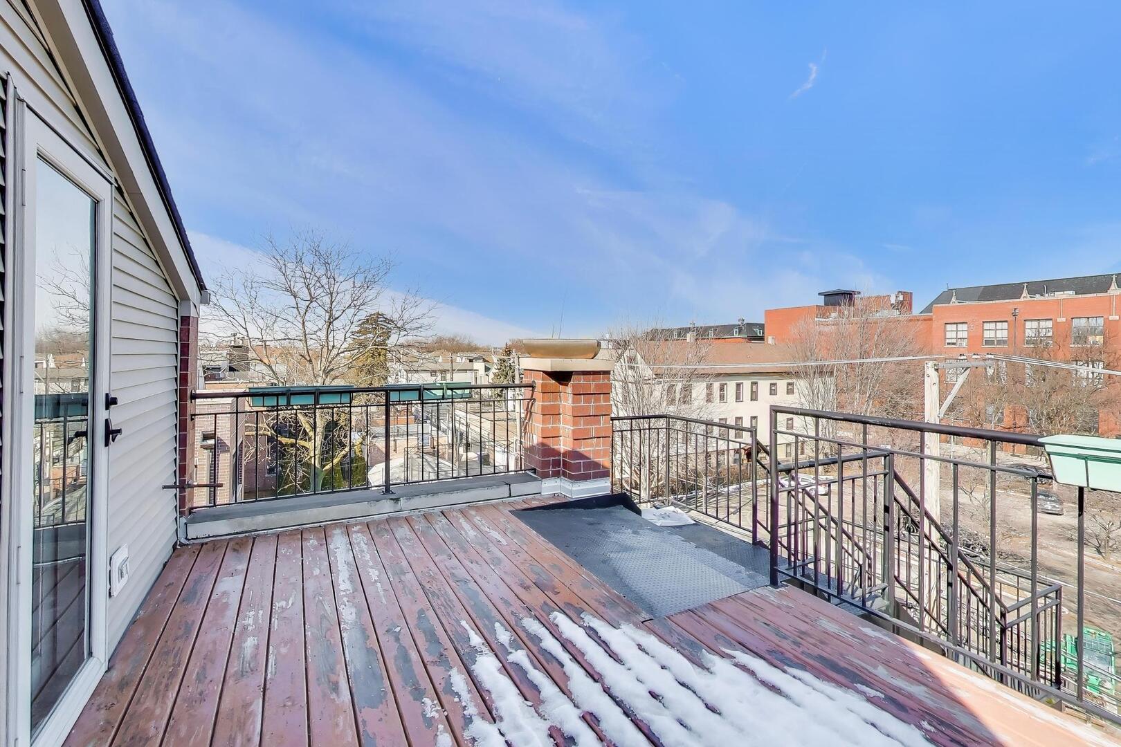 1400 West George Street, Unit 3 Chicago, IL 60657 - Photo 42 of 46 a view of balcony with wooden floor