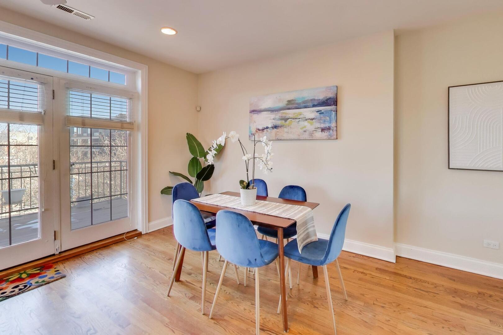 1400 West George Street, Unit 3 Chicago, IL 60657 - Photo 6 of 46 a view of a dining room with furniture and wooden floor