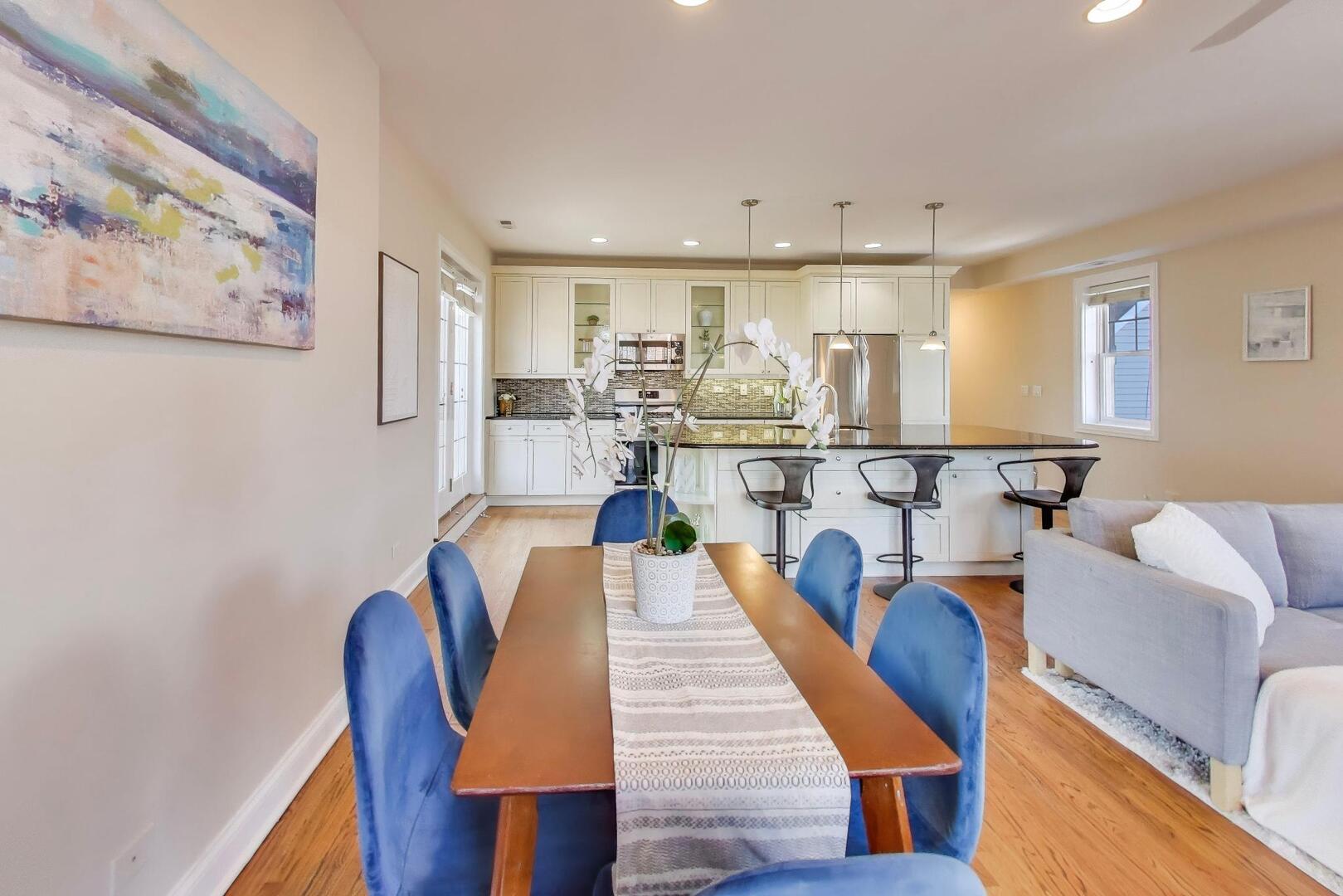1400 West George Street, Unit 3 Chicago, IL 60657 - Photo 7 of 46 a dining room with furniture and wooden floor