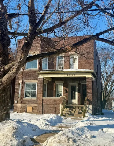 a view of the house with a patio