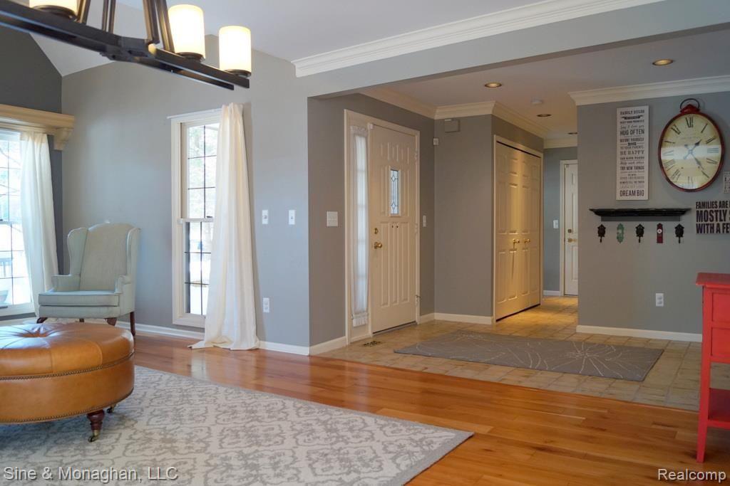 1334 Hathaway Rising Rochester, MI 48306 - Photo 11 of 36 Custom paint, crown moulding, new lighting
