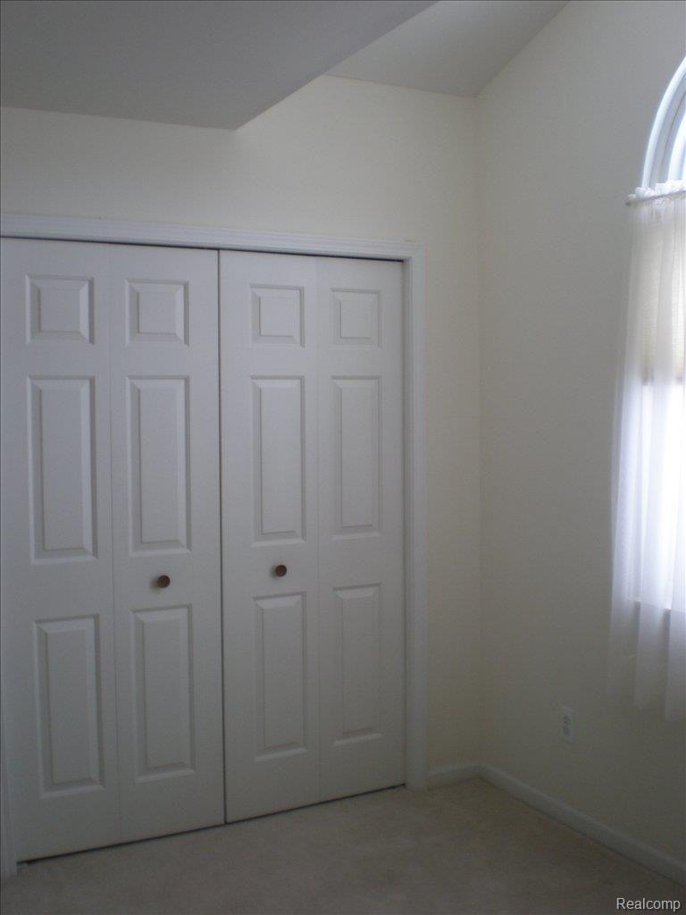 1219 Crystal Pointe Circle, Unit 48 Fenton, MI 48430 - Photo 25 of 25 Spare Bedroom 2