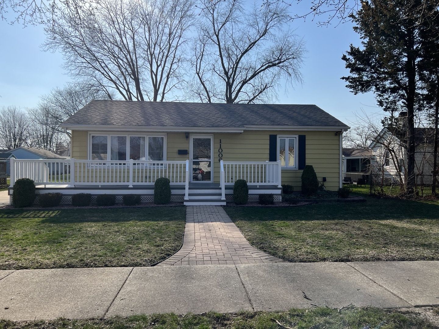 11006 Princess Avenue Chicago Ridge, IL 60415 - Photo 1 of 16 a front view of house with yard and green space