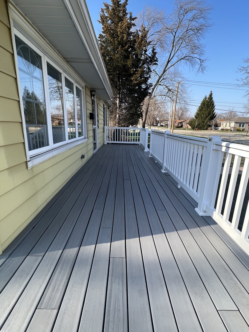 11006 Princess Avenue Chicago Ridge, IL 60415 - Photo 3 of 16 a view of balcony with wooden floor