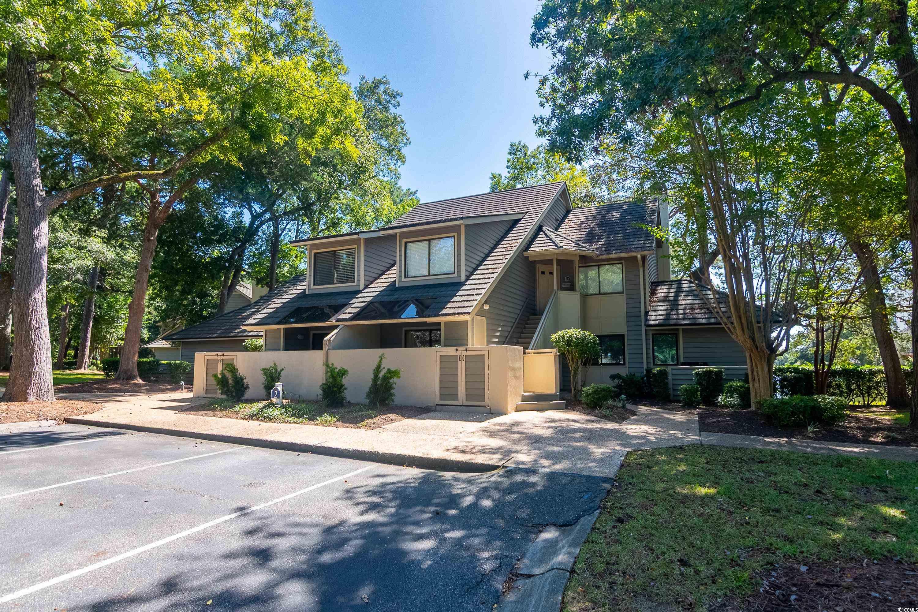 211 Baslow Court, Unit 2C Myrtle Beach, SC 29572 - Photo 1 of 33 Mid-century inspired home with uncovered parking