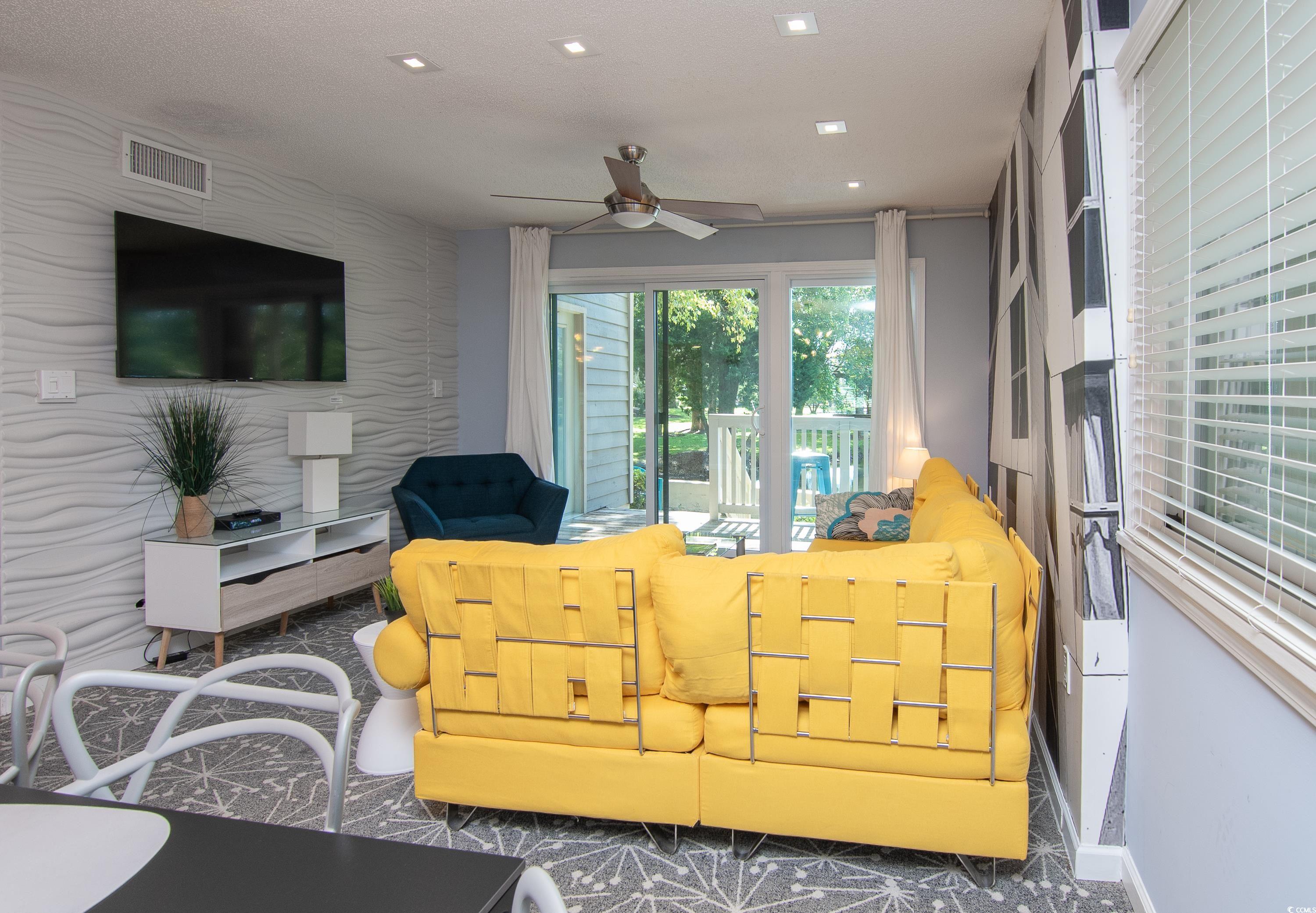 211 Baslow Court, Unit 2C Myrtle Beach, SC 29572 - Photo 12 of 33 Living area with ceiling fan and recessed lighting