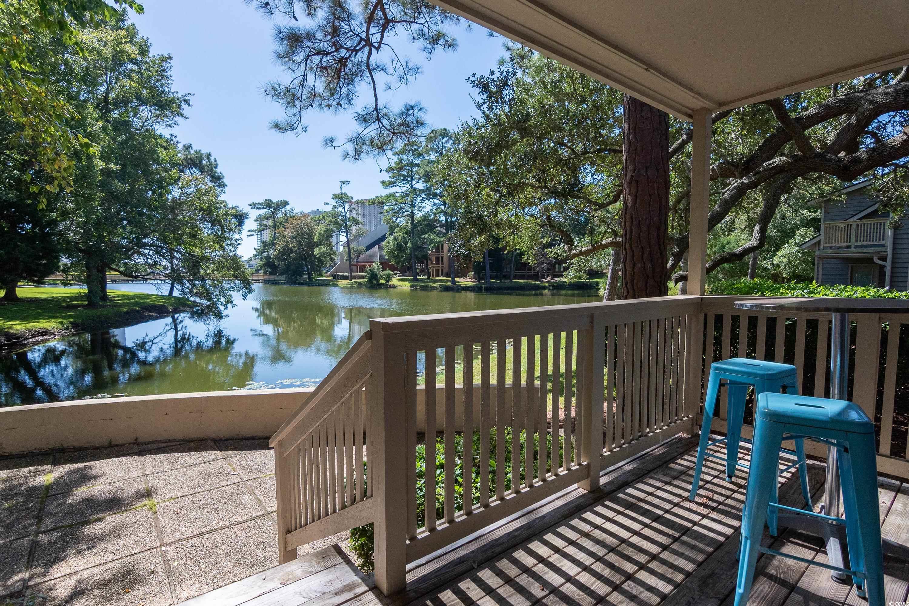 211 Baslow Court, Unit 2C Myrtle Beach, SC 29572 - Photo 29 of 33 Wooden terrace featuring a water view