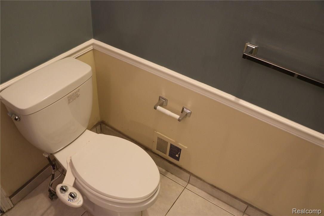 225 East Square Lake Road, Unit 1 Bloomfield Hills, MI 48302 - Photo 17 of 24 Master bathroom toilet with new bidet