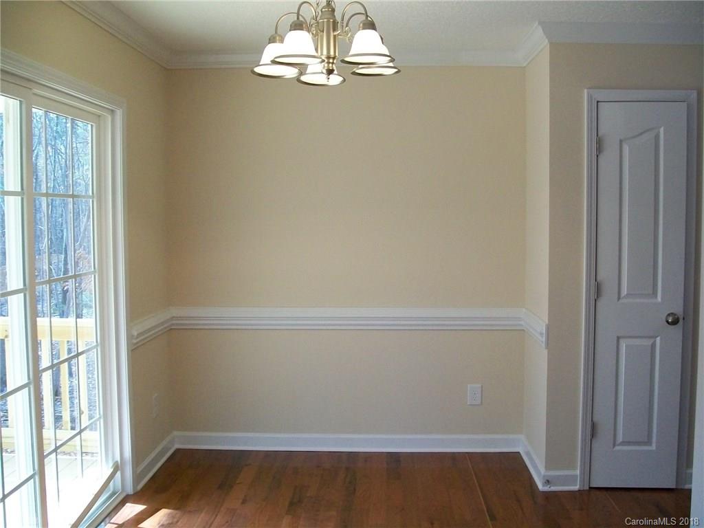 563 Kelly Road, Unit 2 York, SC 29745 - Photo 17 of 19 a view of empty room with wooden floor and fan