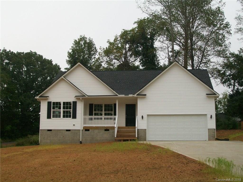 563 Kelly Road, Unit 2 York, SC 29745 - Photo 3 of 19 a front view of a house with a garden and yard