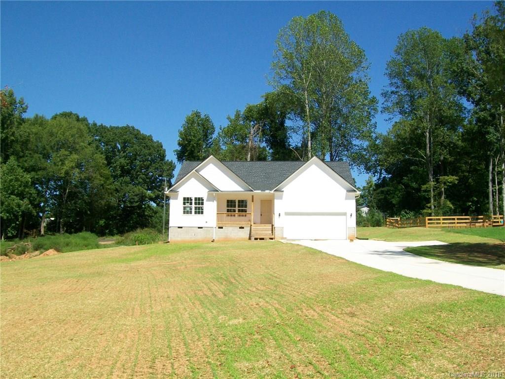 563 Kelly Road, Unit 2 York, SC 29745 - Photo 4 of 19 a house with trees in the background
