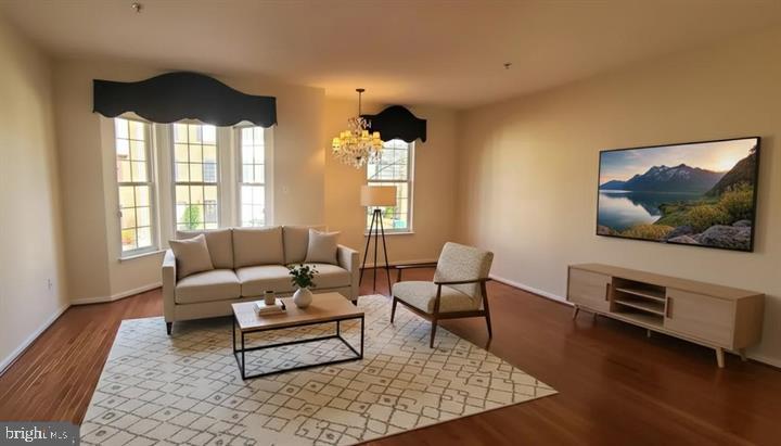 164 Tilden Way, Unit 164 Edgewater, MD 21037 - Photo 10 of 24 a living room with furniture and a large window