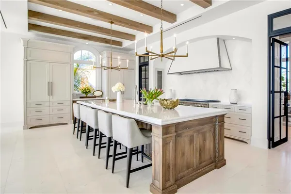 a room with air conditioner duct and white walls