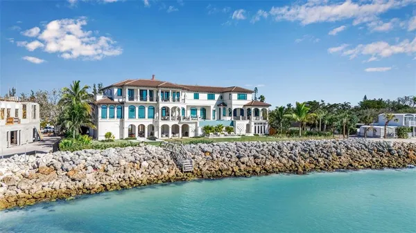 a view of balcony with furniture