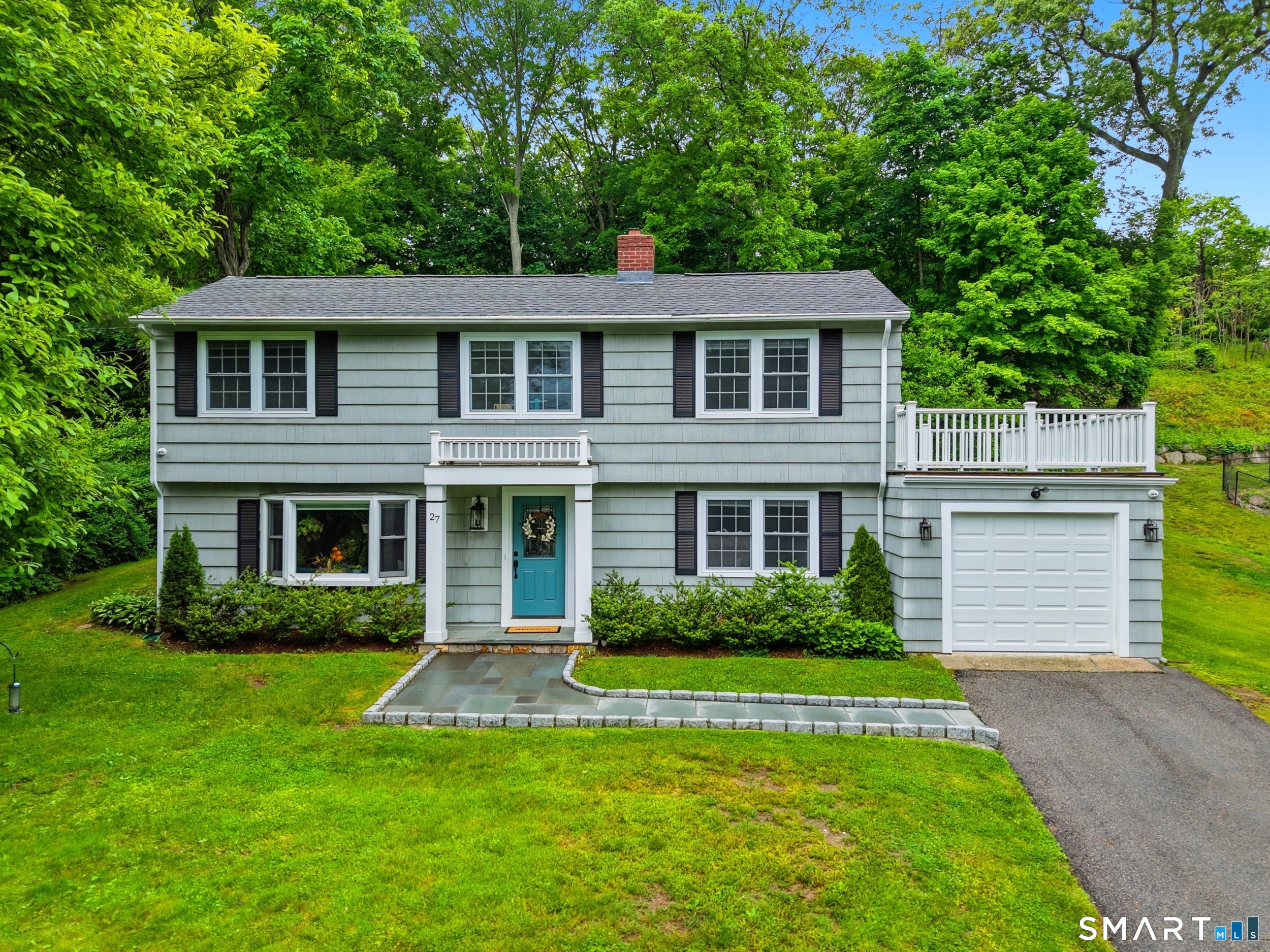 27 Shawnee Road Trumbull, CT 06611 - Photo 1 of 1 a front view of a house with a yard