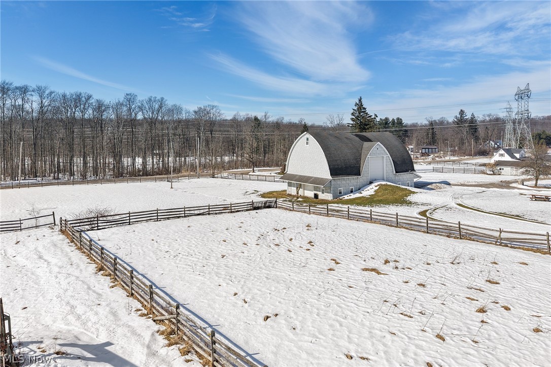 9455 Robinson Road Chardon, OH 44024 - Photo 32 of 33 View of yard featuring a barn and an outdoor structure