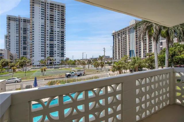 a view of city with tall buildings