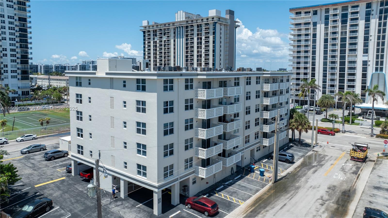 1901 South Ocean Drive, Unit 207 Hollywood, FL 33019 - Photo 31 of 47 a large building with a outdoor space