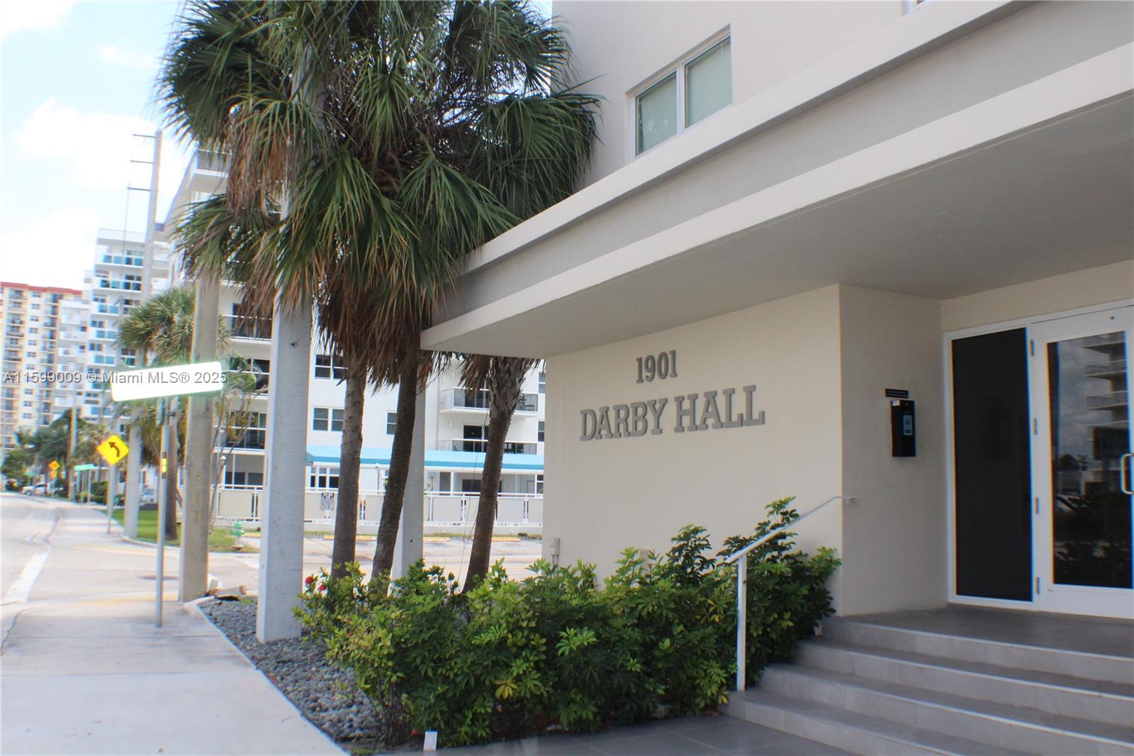1901 South Ocean Drive, Unit 207 Hollywood, FL 33019 - Photo 39 of 47 a couple of palm trees in front of building