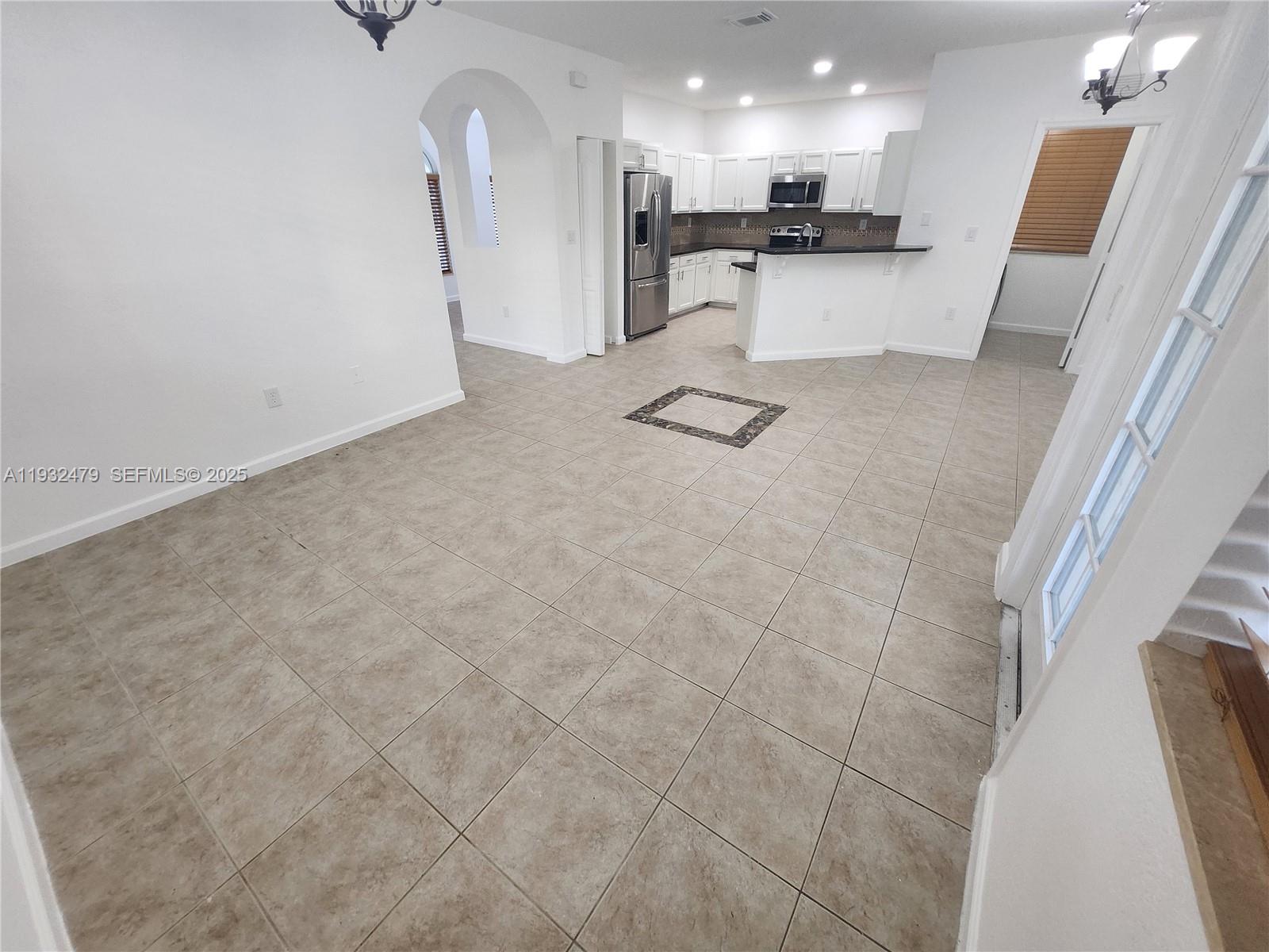 13973 Southwest 276th Way Homestead, FL 33032 - Photo 15 of 43 a view of a kitchen with a sink