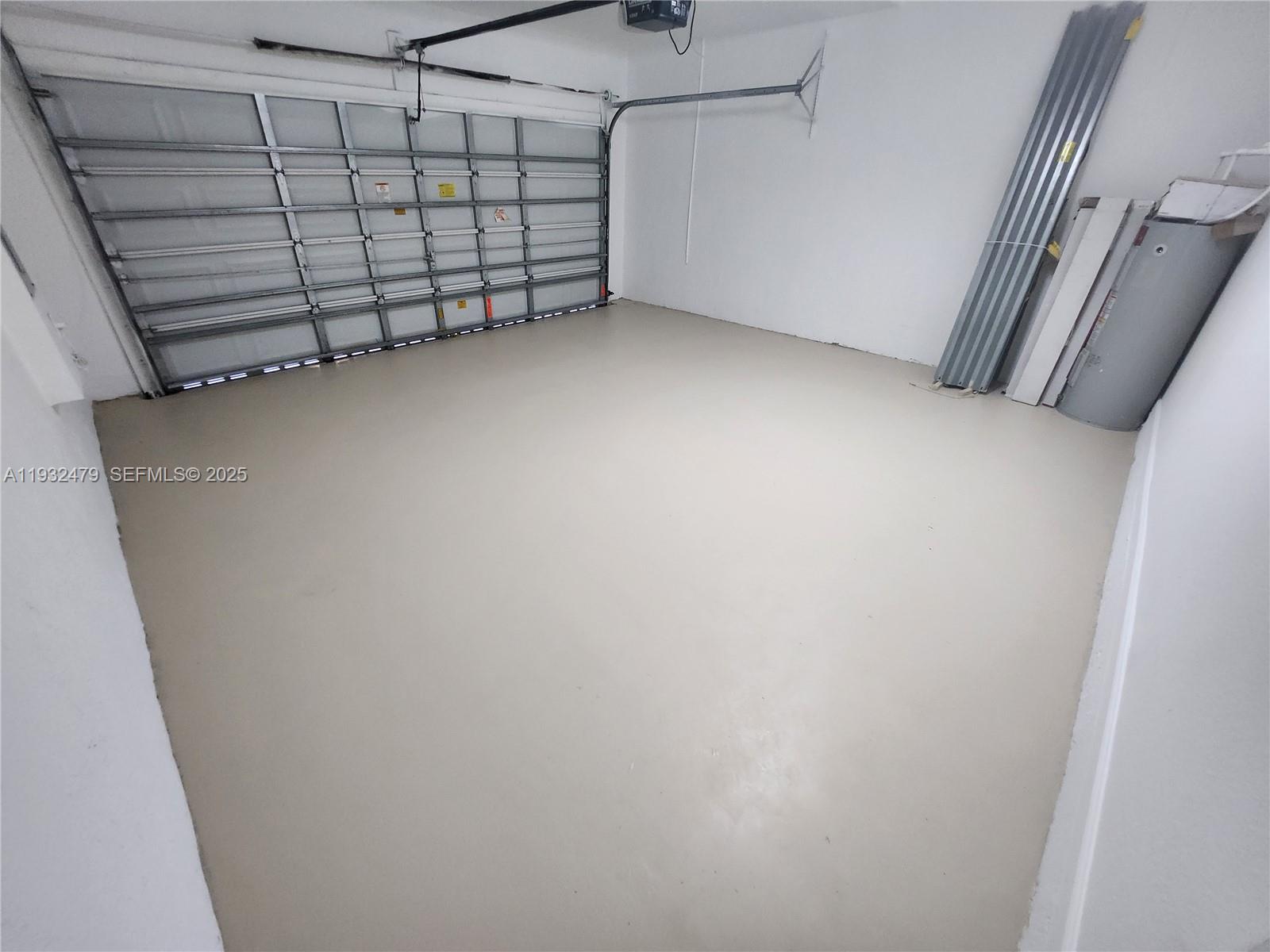 13973 Southwest 276th Way Homestead, FL 33032 - Photo 17 of 43 a view of a garage