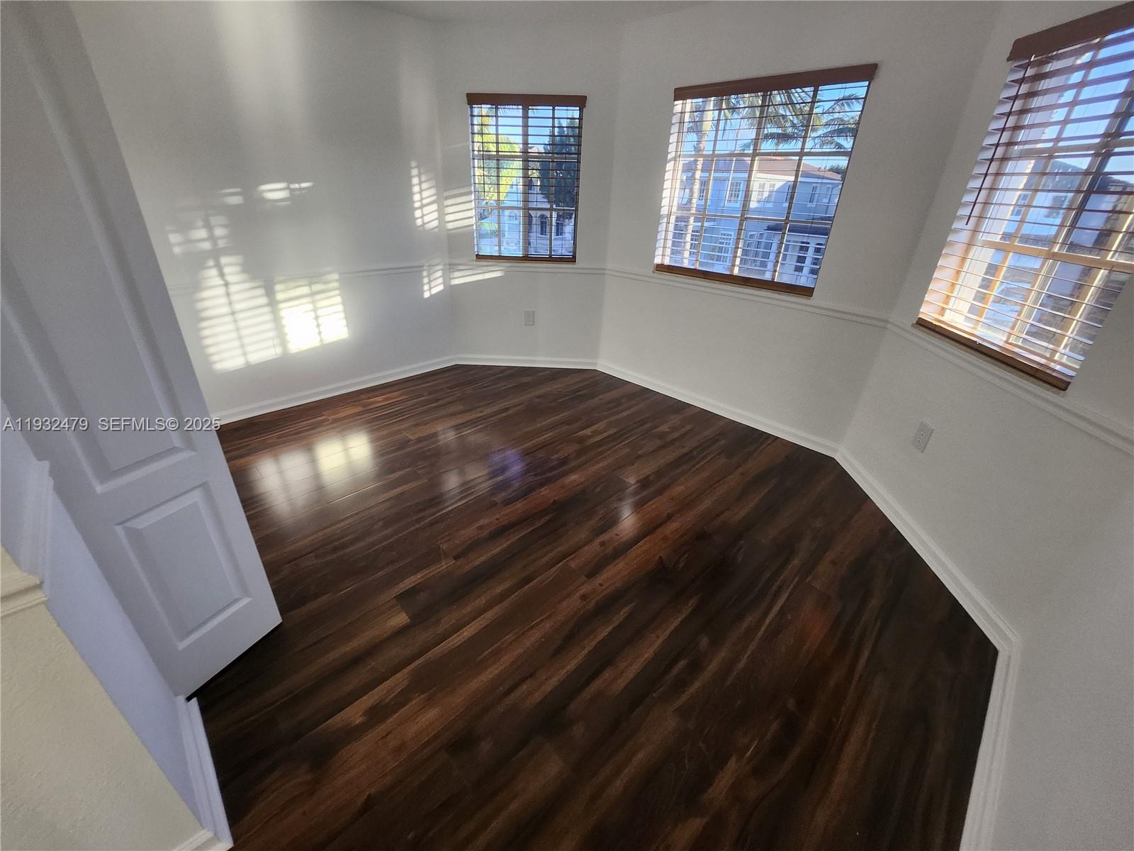 13973 Southwest 276th Way Homestead, FL 33032 - Photo 22 of 43 a view of an empty room and window