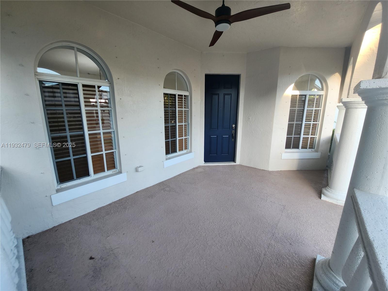 13973 Southwest 276th Way Homestead, FL 33032 - Photo 5 of 43 a view of an empty room with a window and fireplace