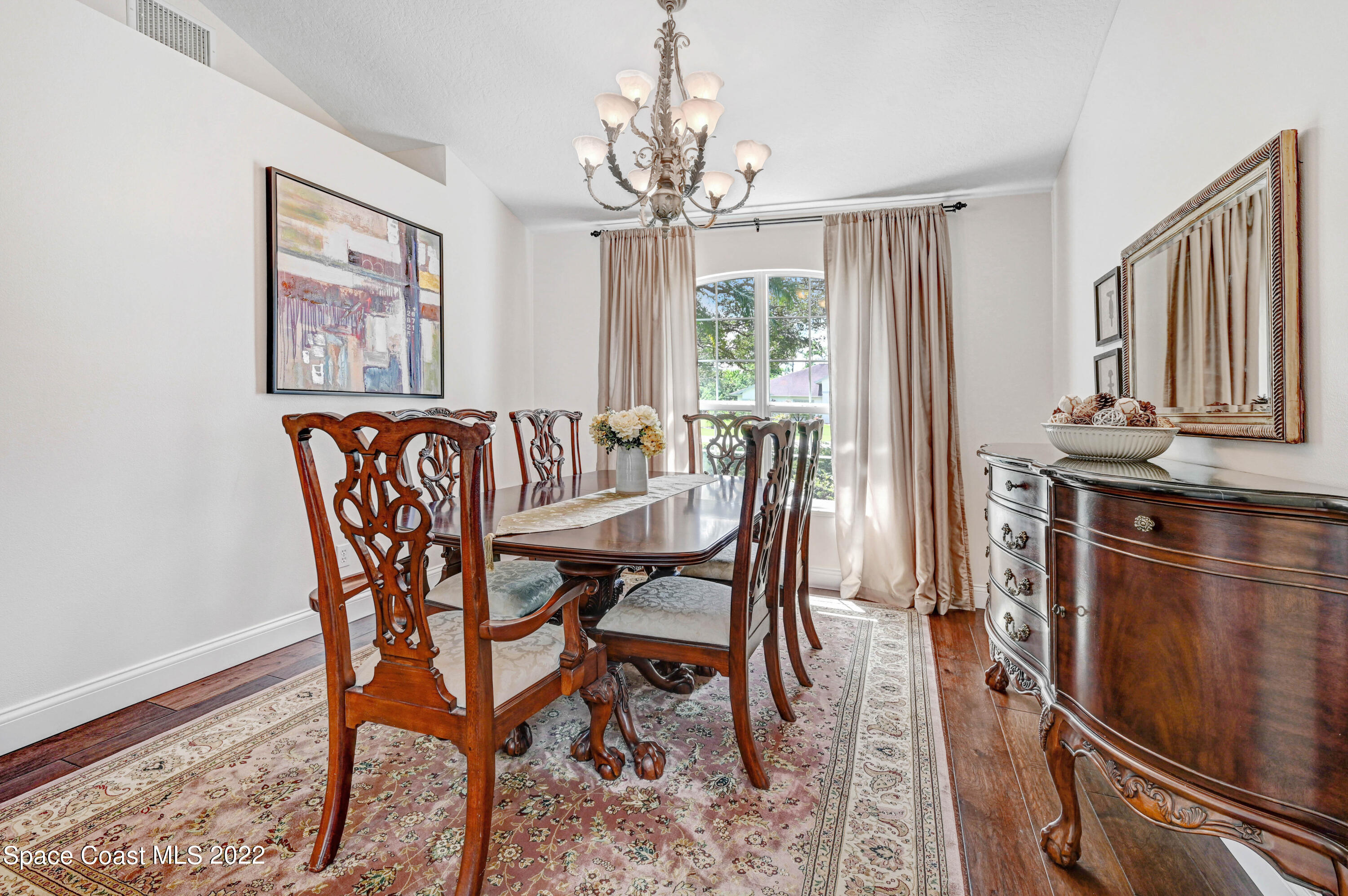 3700 Big Pine Road Melbourne, FL 32934 - Photo 16 of 64 a view of a dining room with furniture window and outside view