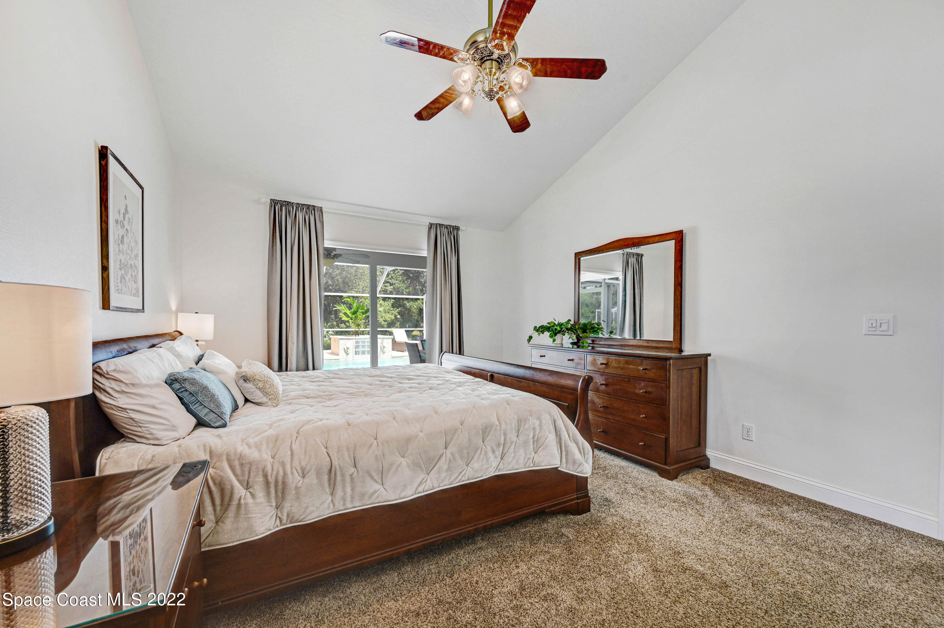 3700 Big Pine Road Melbourne, FL 32934 - Photo 29 of 64 a bedroom with a bed and a window