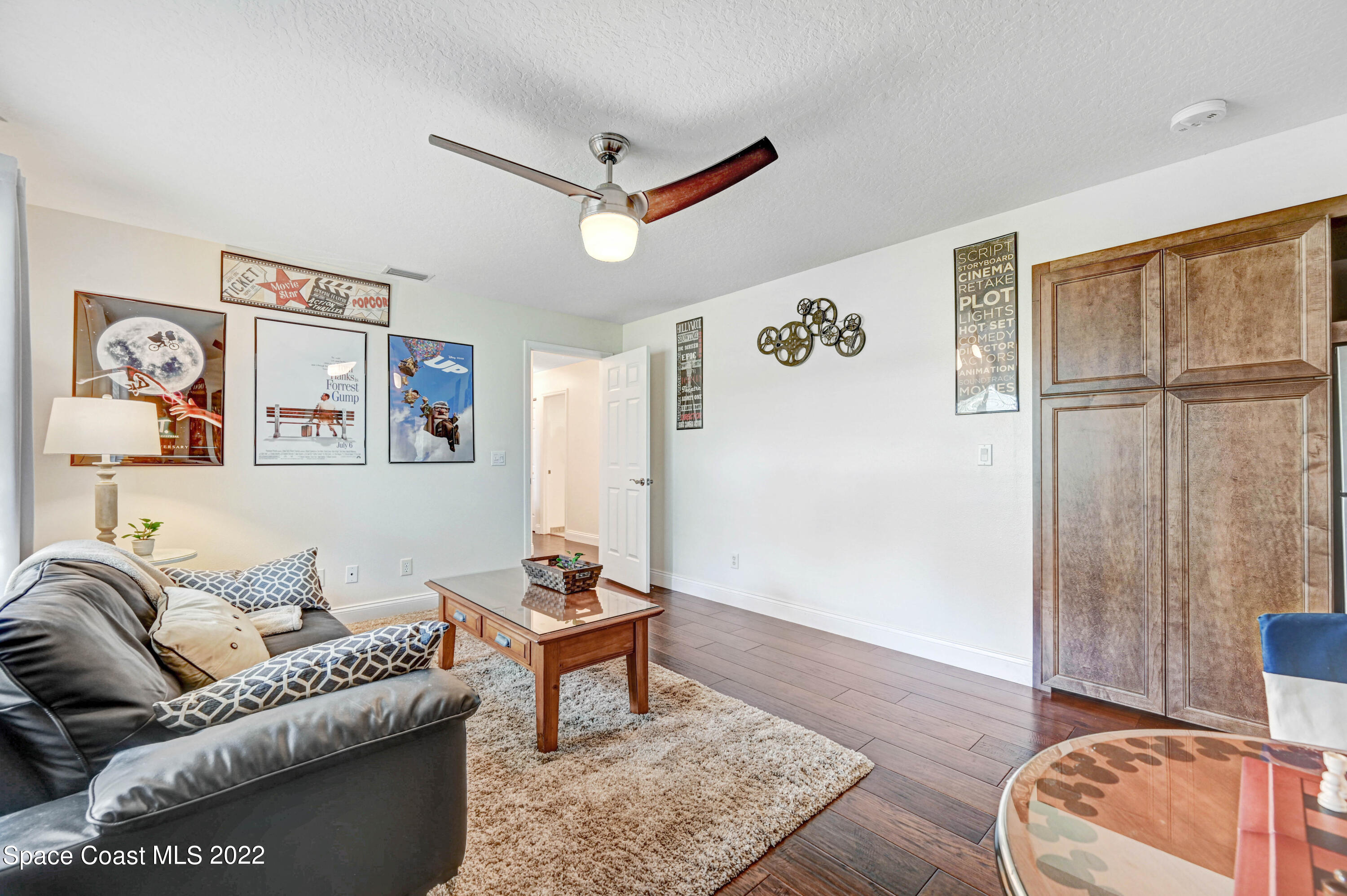 3700 Big Pine Road Melbourne, FL 32934 - Photo 34 of 64 a living room with furniture and a window