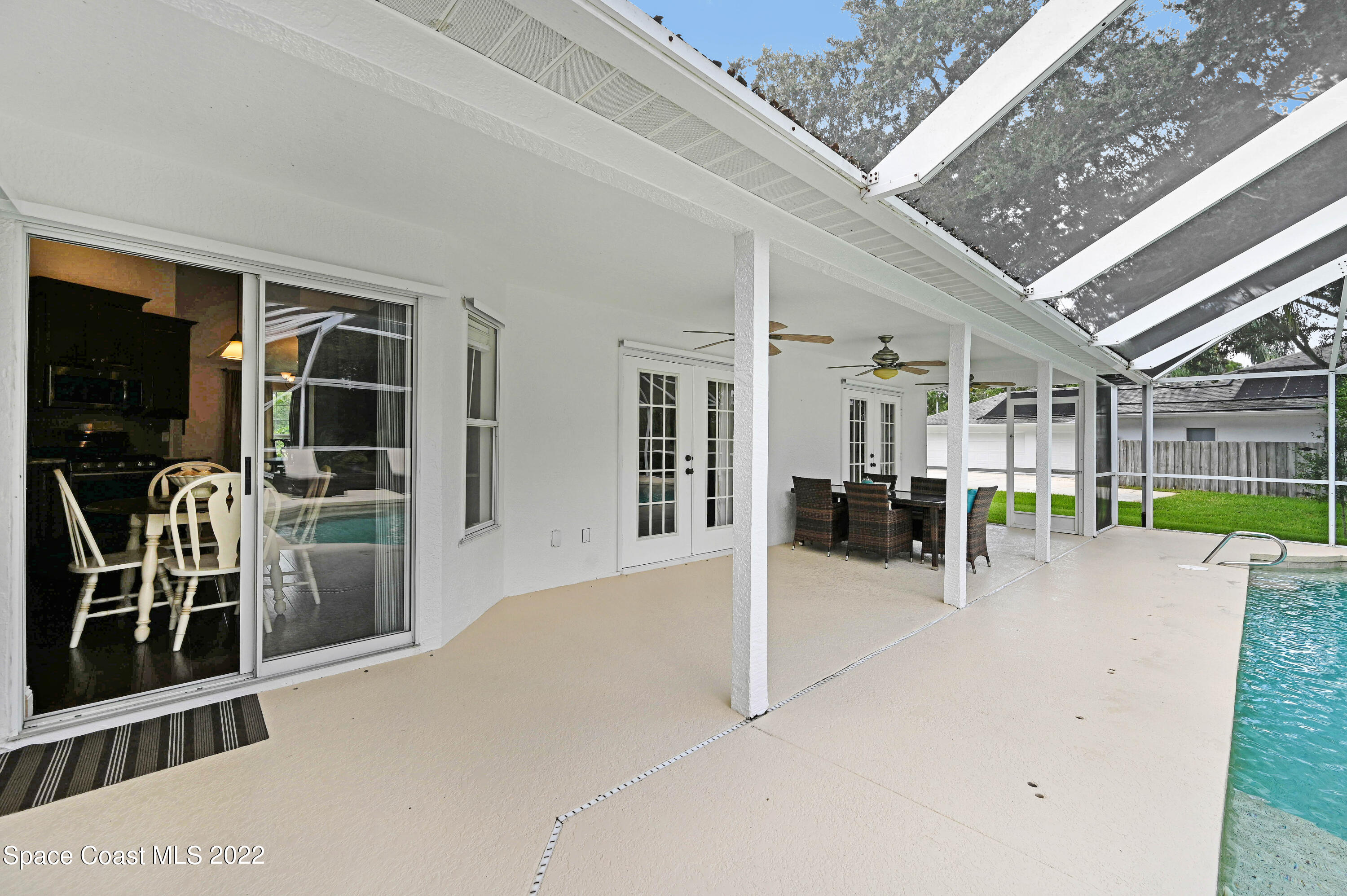 3700 Big Pine Road Melbourne, FL 32934 - Photo 55 of 64 a view of a livingroom with furniture and kitchen view