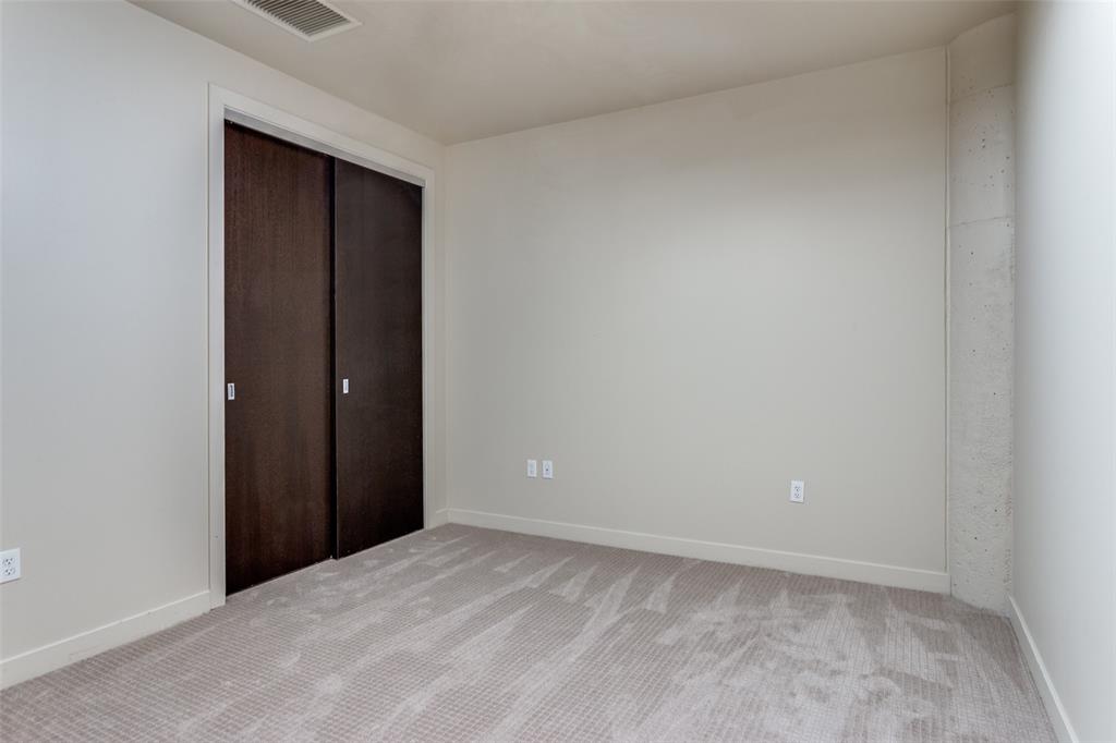 2600 West 7th Street, Unit 1311 Fort Worth, TX 76107 - Photo 14 of 25 a view of an empty room