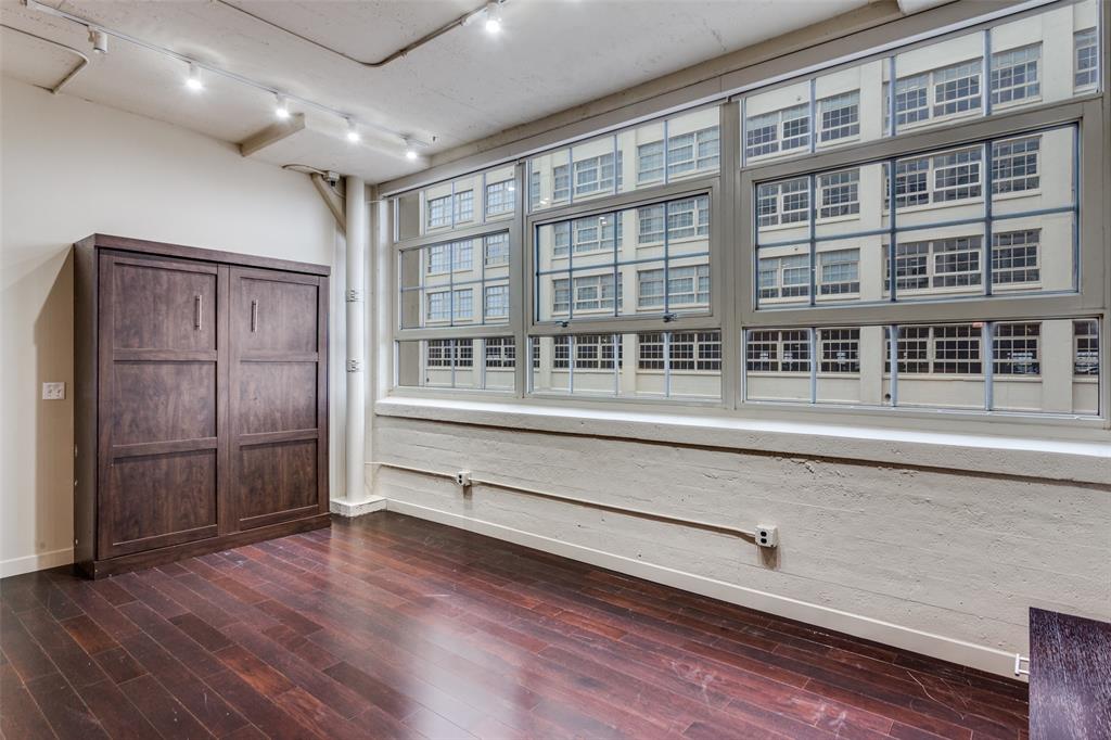 2600 West 7th Street, Unit 1311 Fort Worth, TX 76107 - Photo 5 of 25 a view of a building with glass door