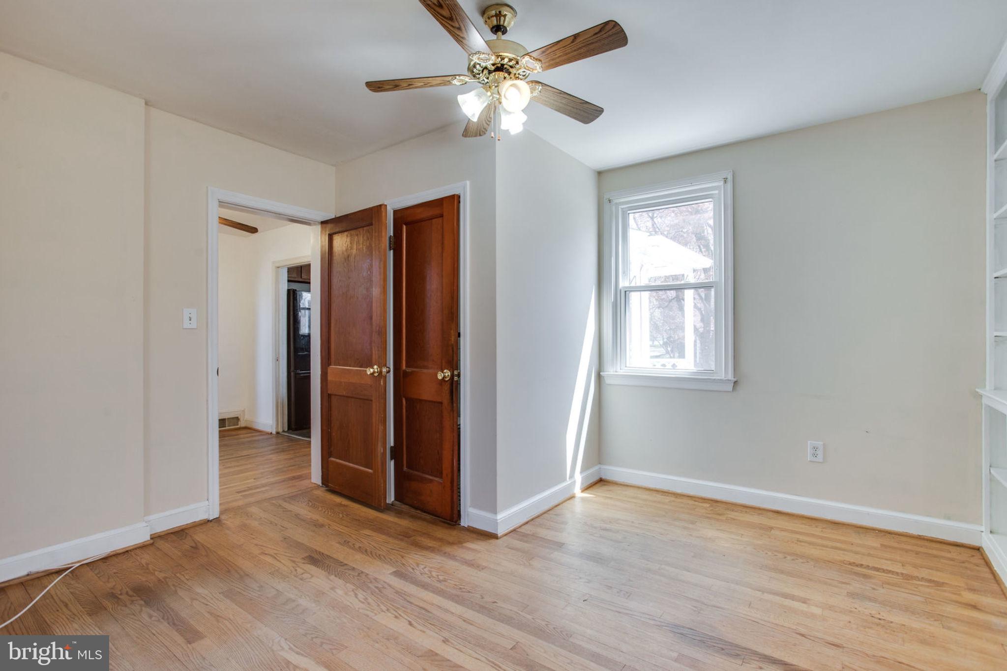 813 Baltimore Road Rockville, MD 20851 - Photo 14 of 32 Family Room w/Half Bath